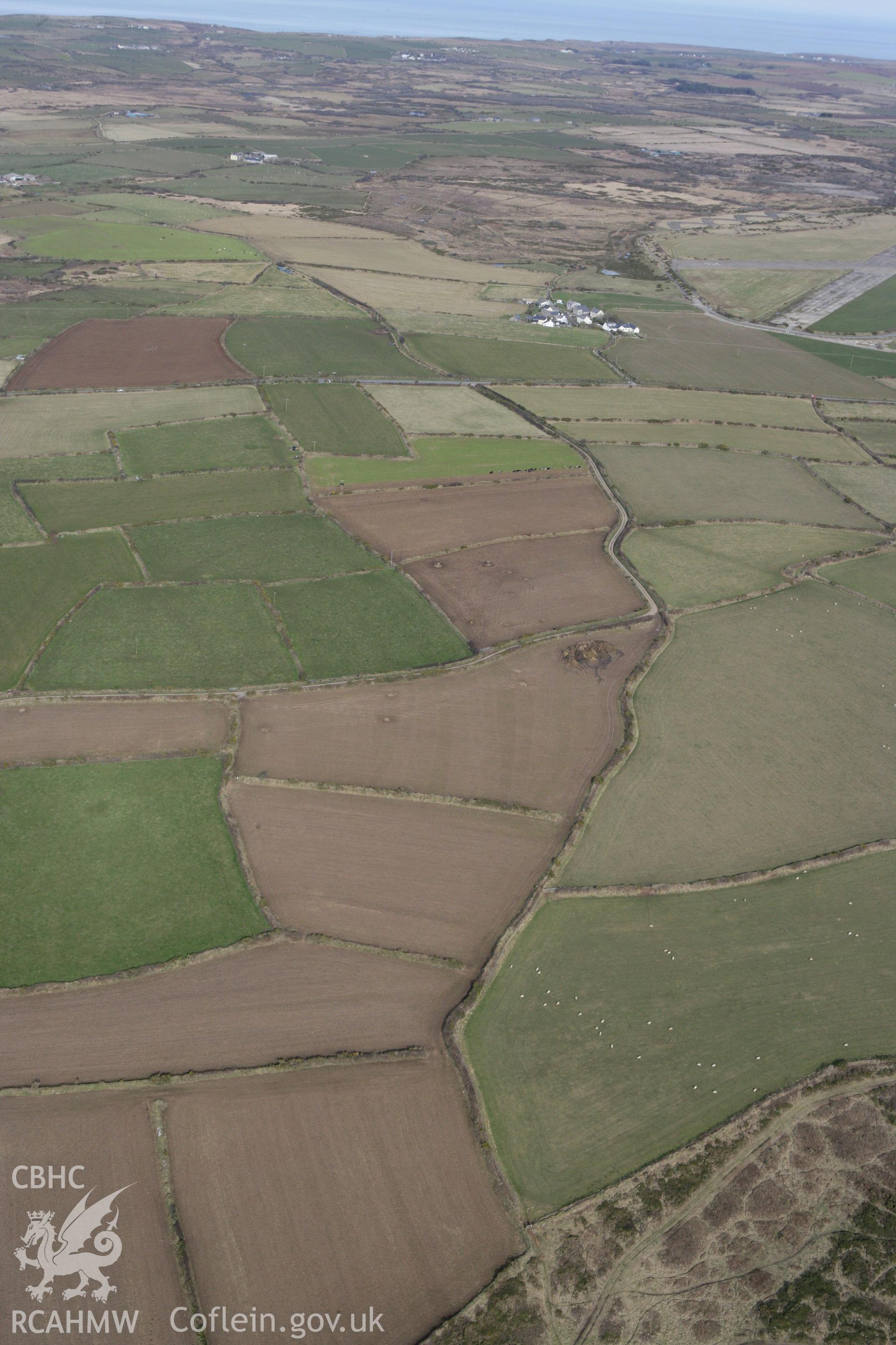 RCAHMW colour oblique aerial photograph of Ffos y Mynach, St Davids. Taken on 02 March 2010 by Toby Driver