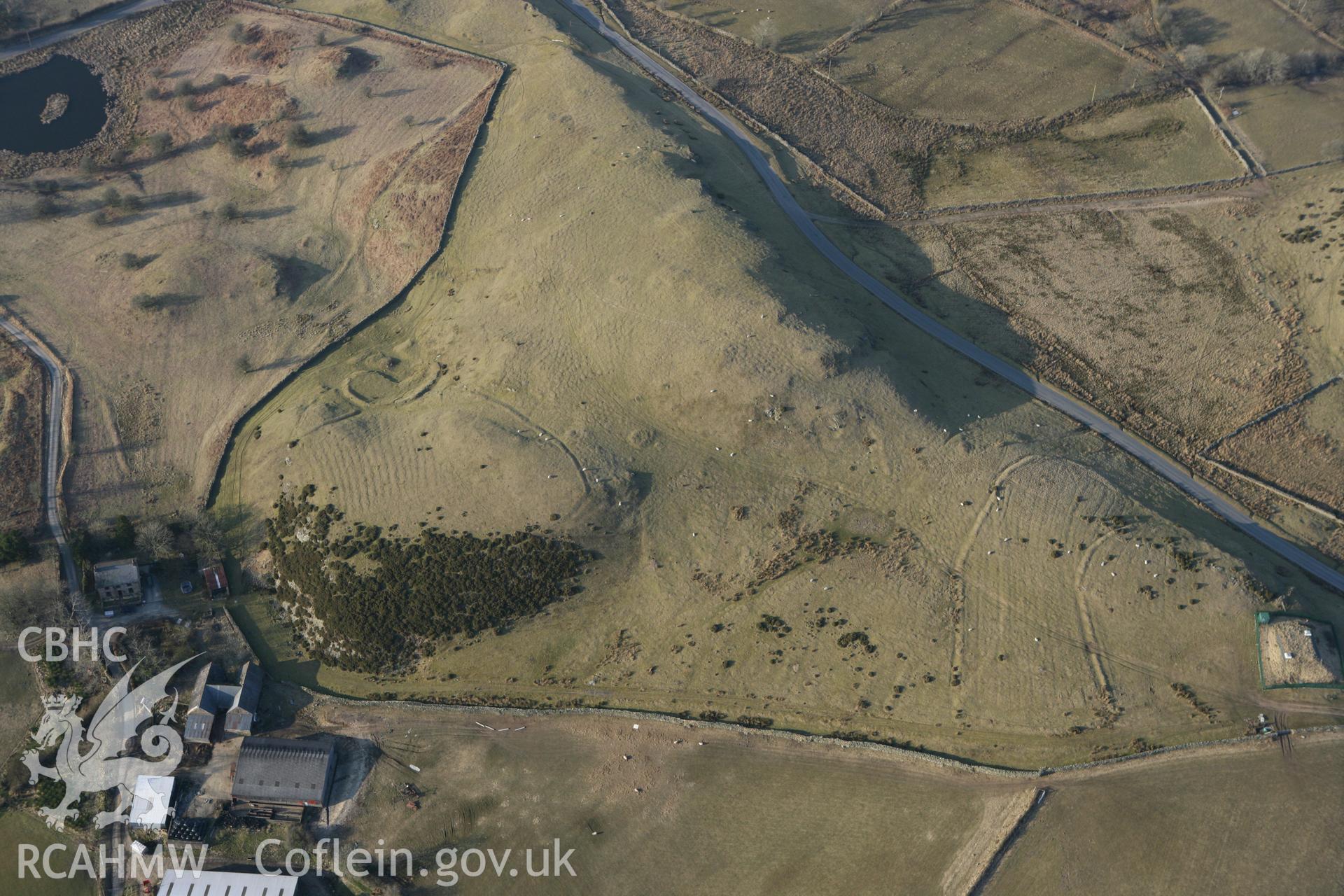 RCAHMW colour oblique photograph of Upper House, platform house and deserted settlement. Taken by Toby Driver on 11/03/2010.
