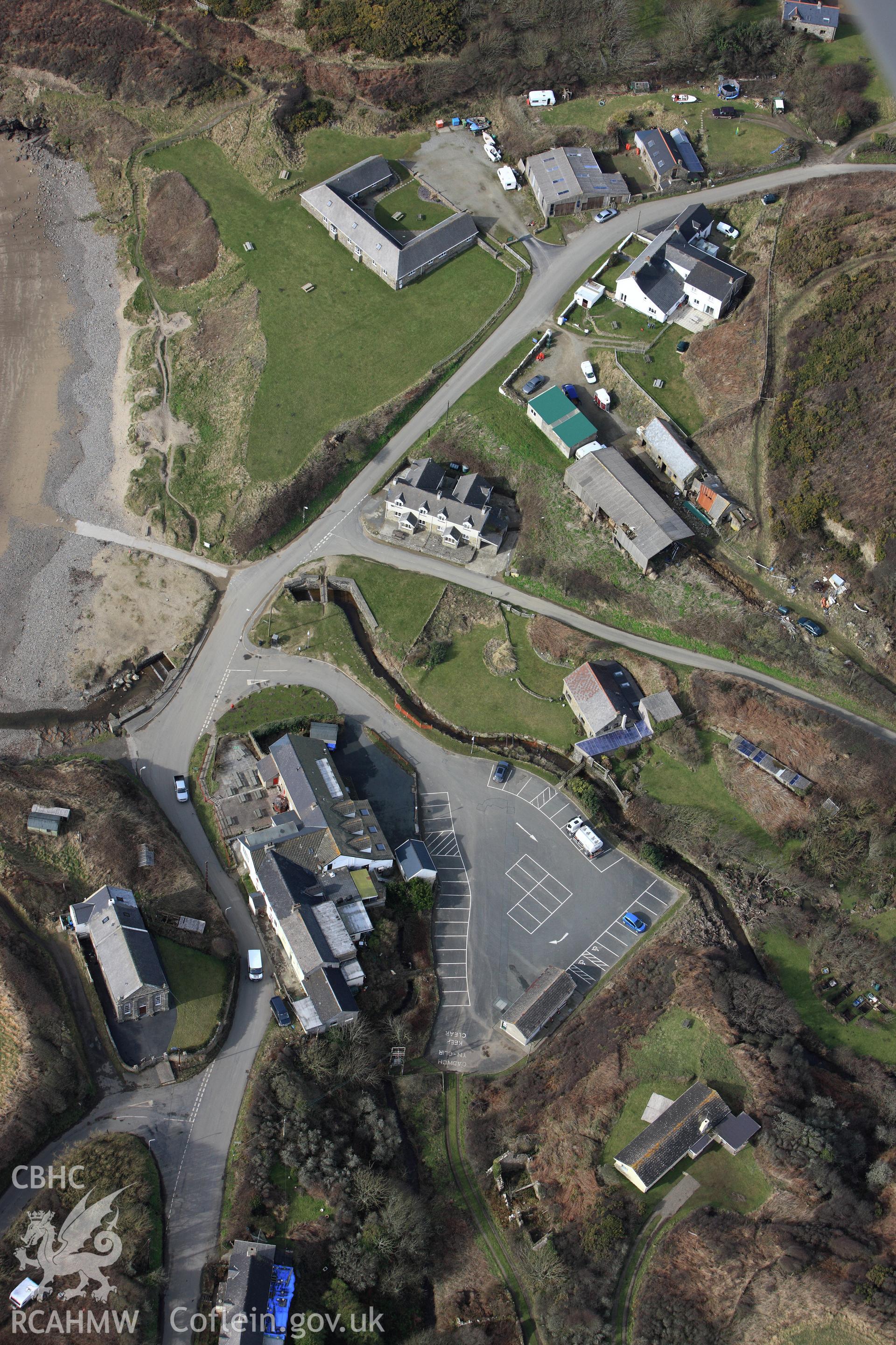 RCAHMW colour oblique aerial photograph of Nolton Haven Village. Taken on 02 March 2010 by Toby Driver