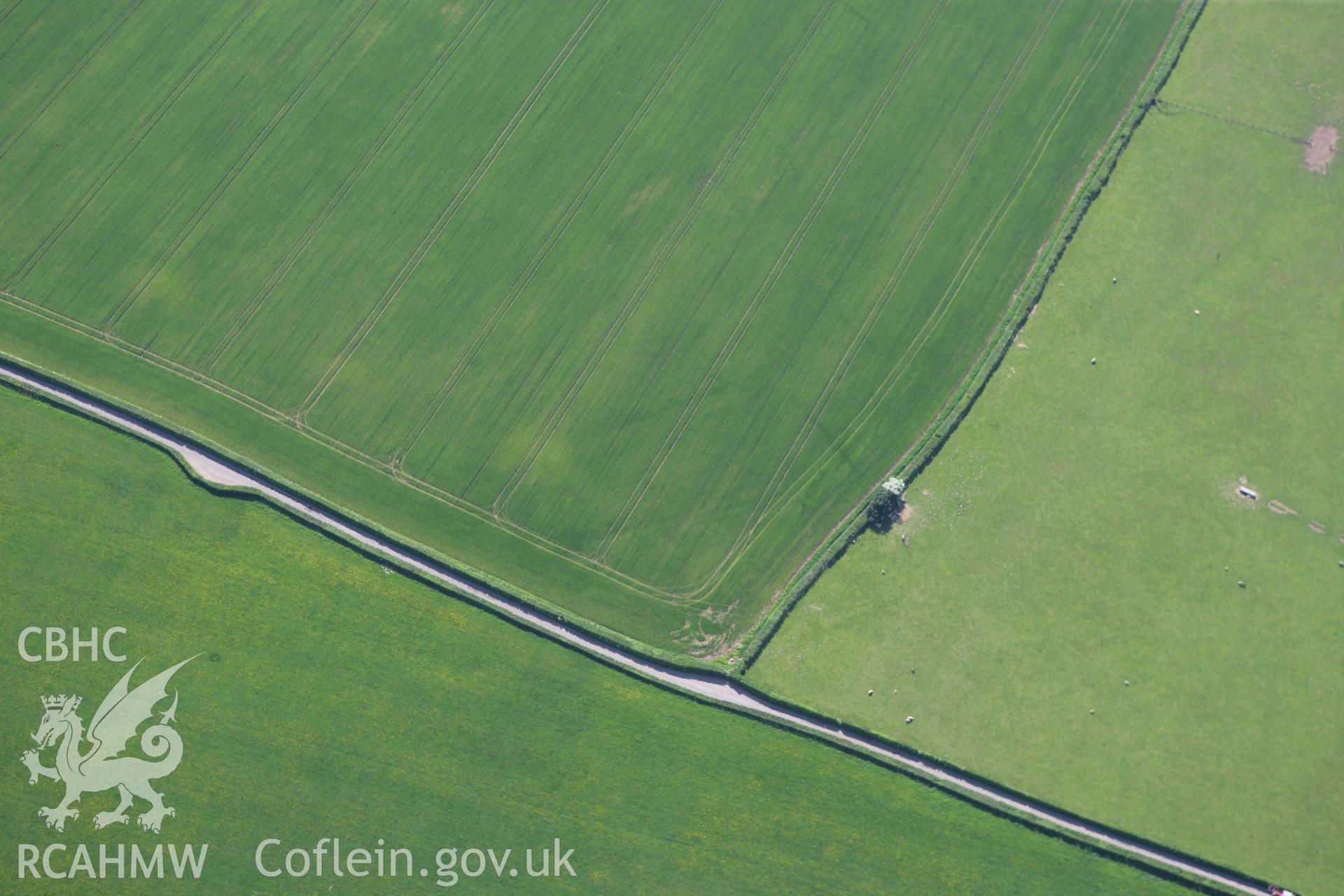RCAHMW colour oblique photograph of Five Lanes Roman Site. Taken by Toby Driver on 24/05/2010.