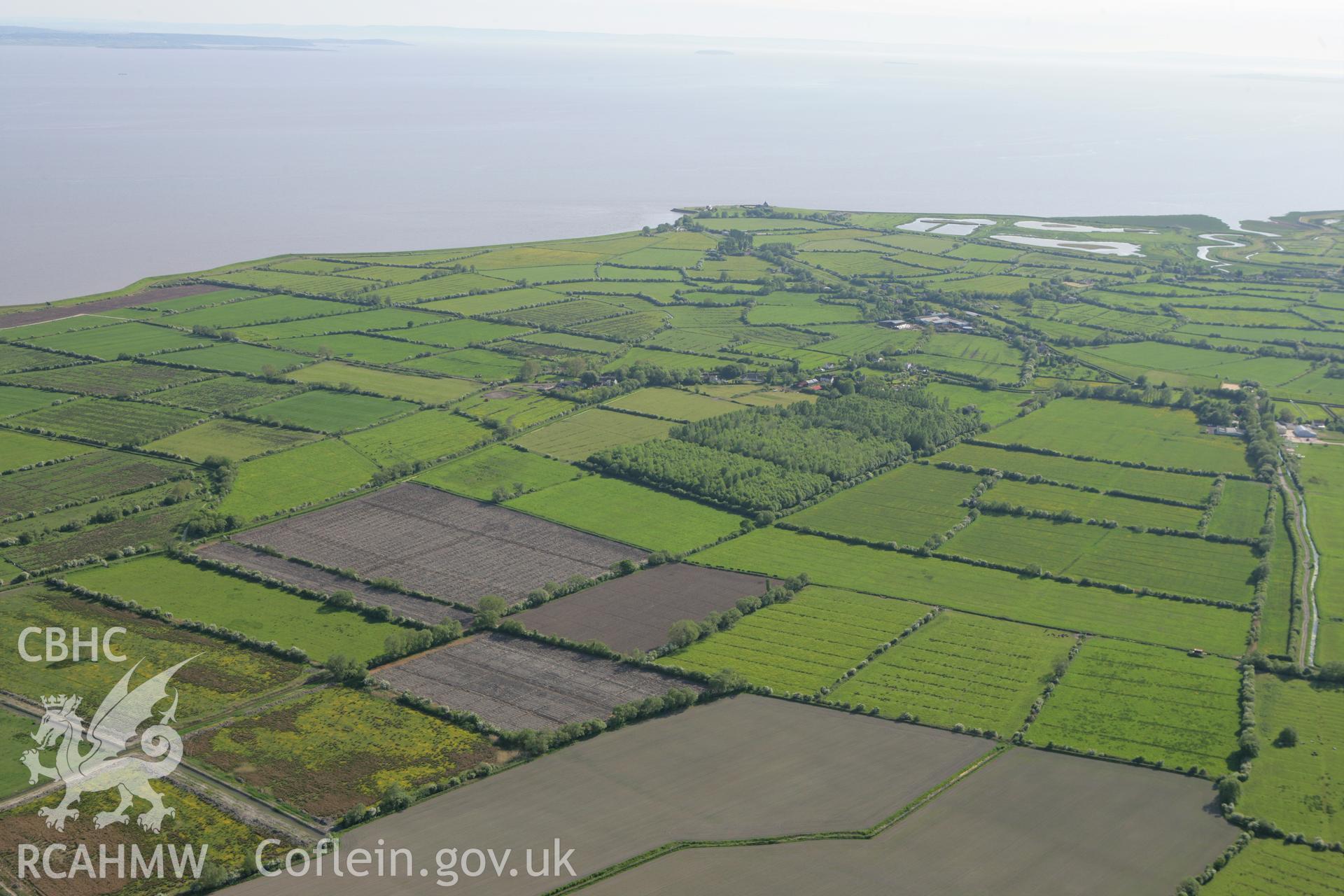 RCAHMW colour oblique photograph of Caldicot Levels looking south-west towards Goldcliff Priory. Taken by Toby Driver on 24/05/2010.