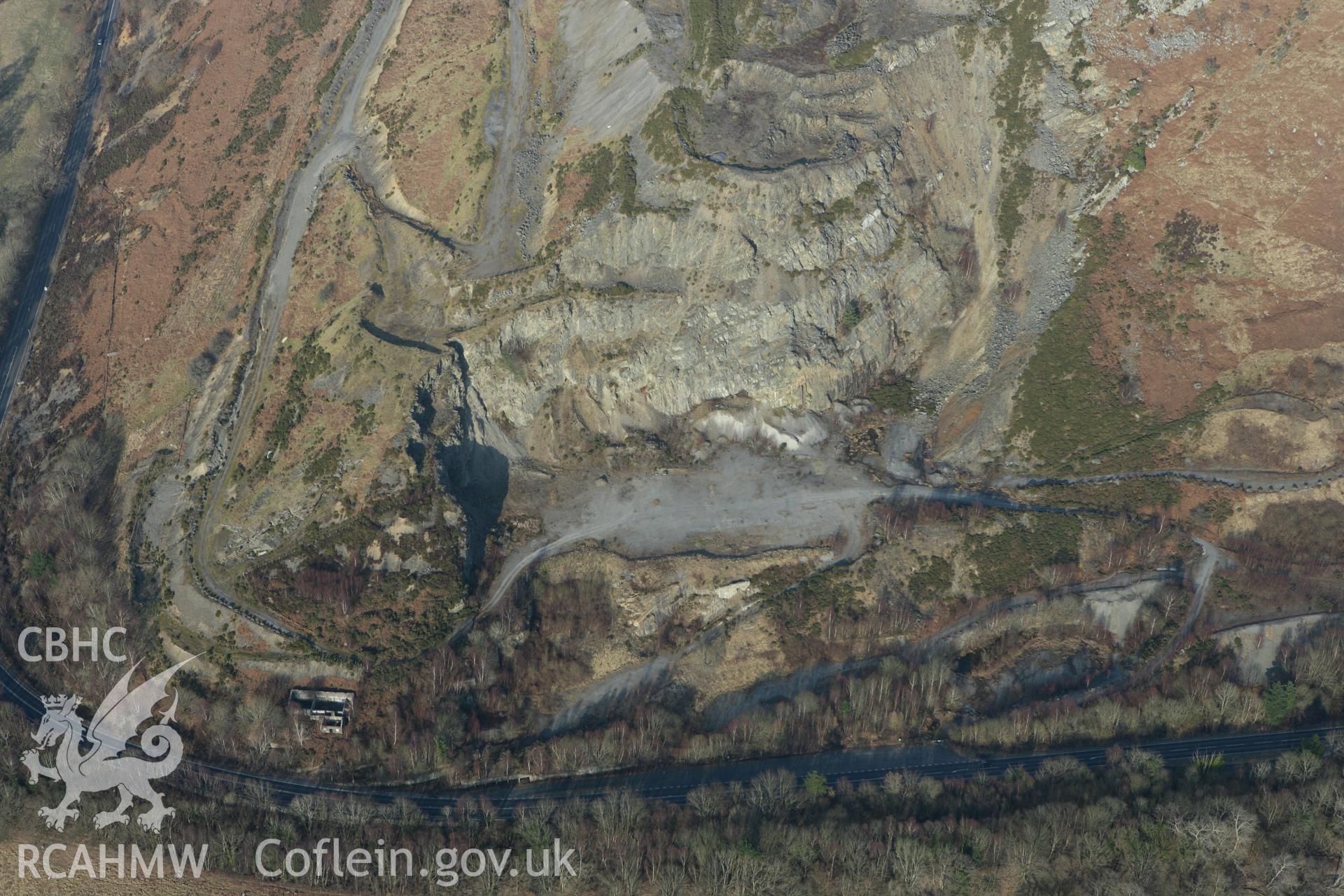 RCAHMW colour oblique photograph of Cerrig Gwynion Quarry. Taken by Toby Driver on 11/03/2010.