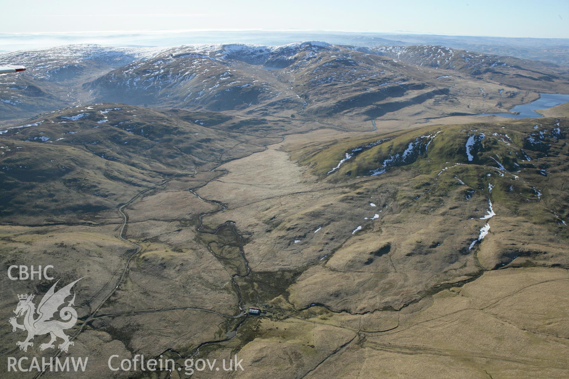 RCAHMW colour oblique photograph of Hyddgen lead mine, with Nant y moch reservoir, from the north. Taken by Toby Driver on 08/03/2010.