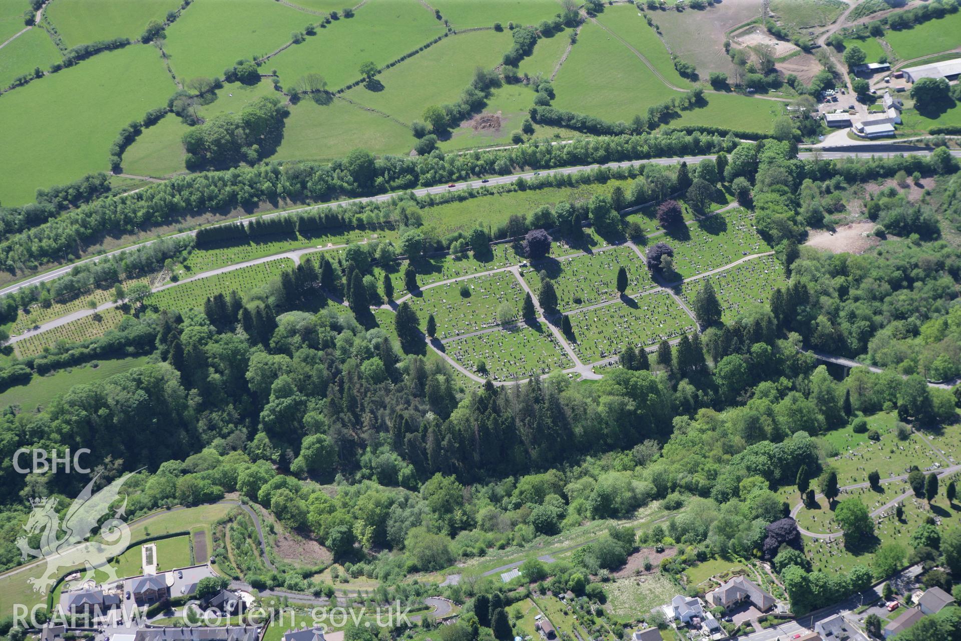 RCAHMW colour oblique photograph of Cefn-coed-y-cymmer cemetery. Taken by Toby Driver on 24/05/2010.