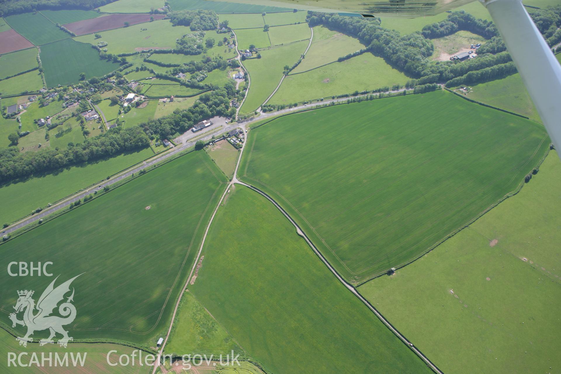 RCAHMW colour oblique photograph of Five Lanes Roman Site. Taken by Toby Driver on 24/05/2010.