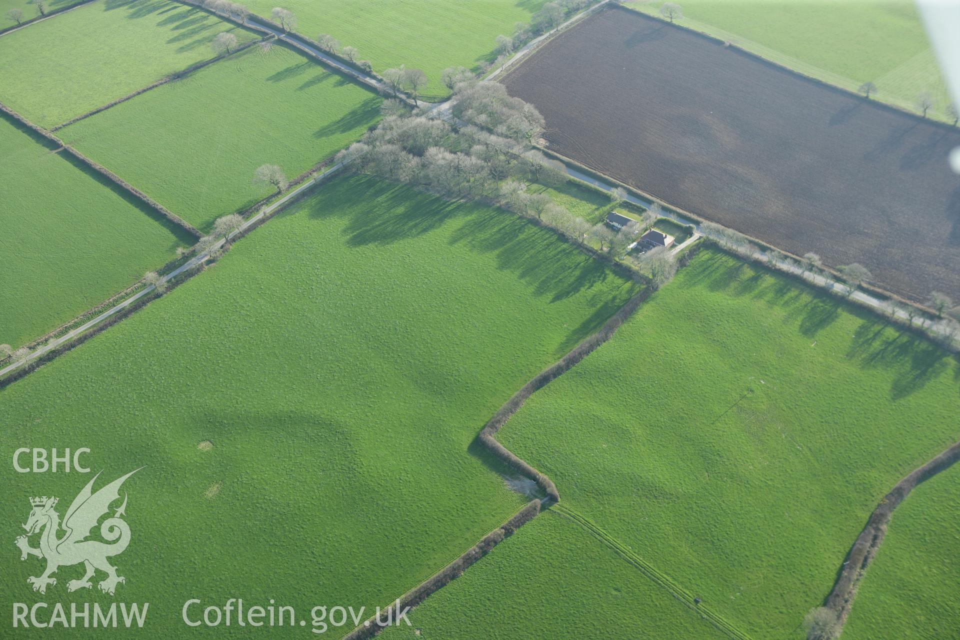 RCAHMW colour oblique aerial photograph of earthworks of Long Wood Quarries. Taken on 13 April 2010 by Toby Driver