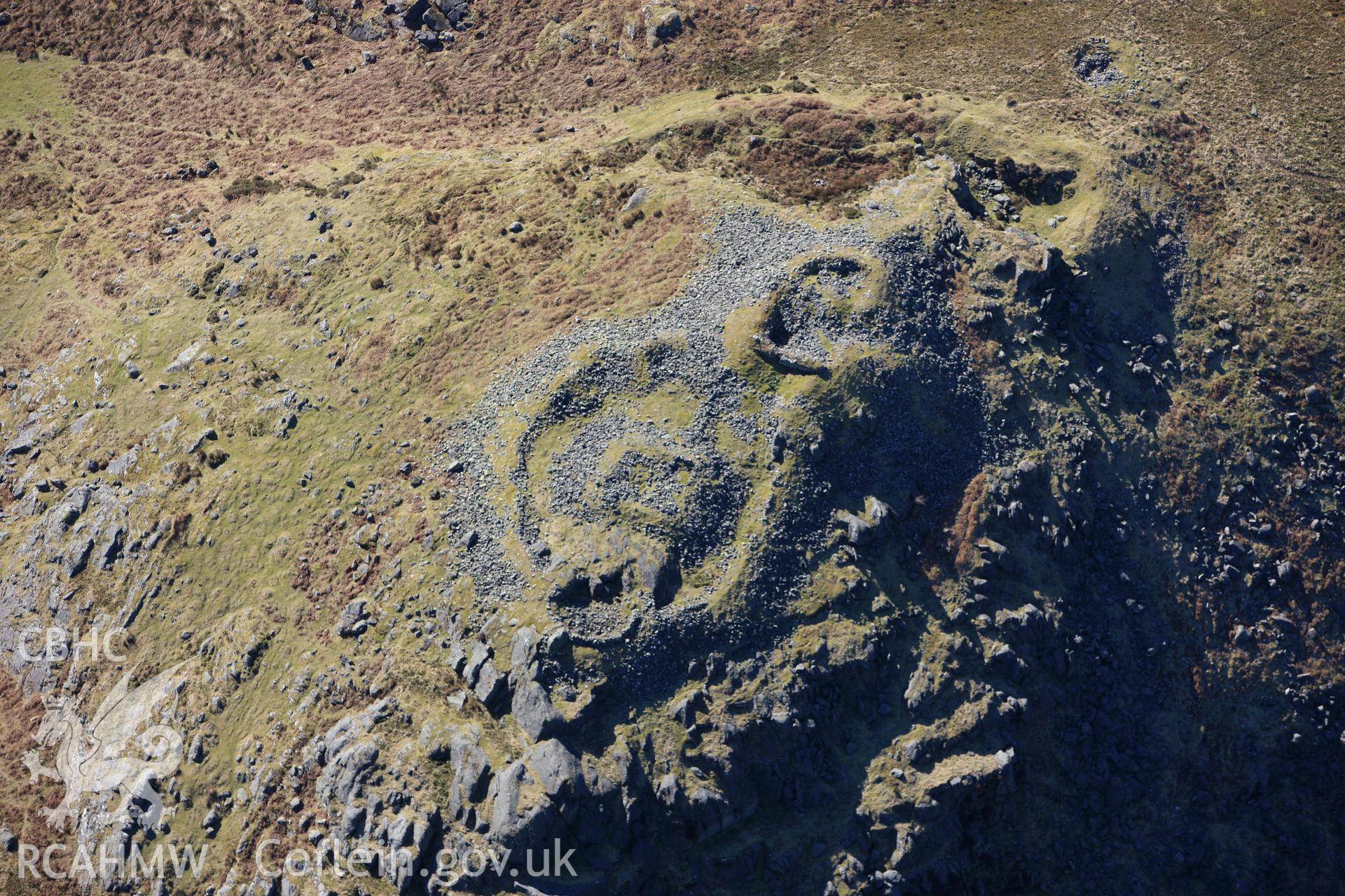 RCAHMW colour oblique photograph of Castell Carndochan, Dolhendre. Taken by Toby Driver on 08/03/2010.