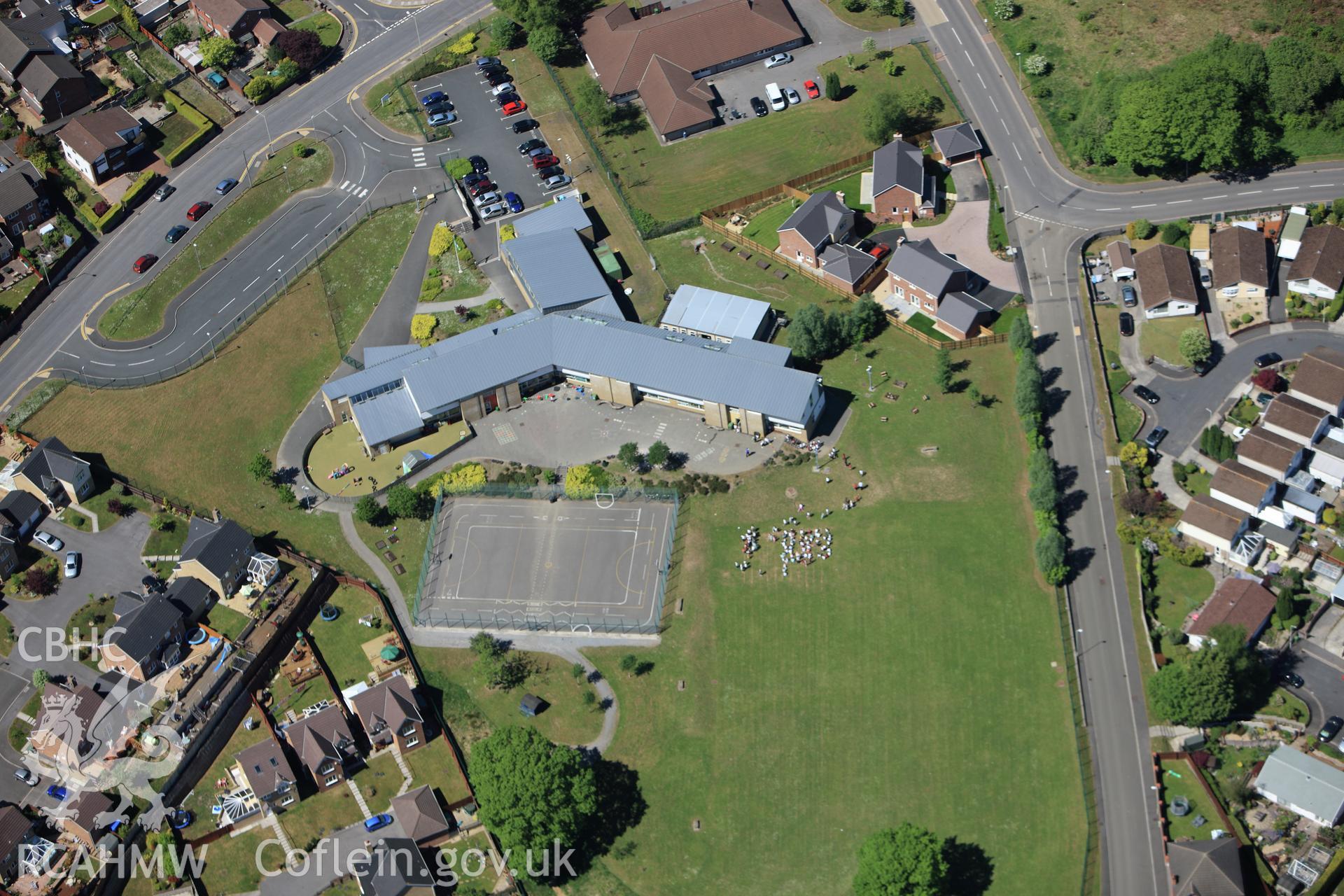 RCAHMW colour oblique photograph of Ysgol Gynradd Gymraeg Aberdar, Aberdare. Taken by Toby Driver on 24/05/2010.