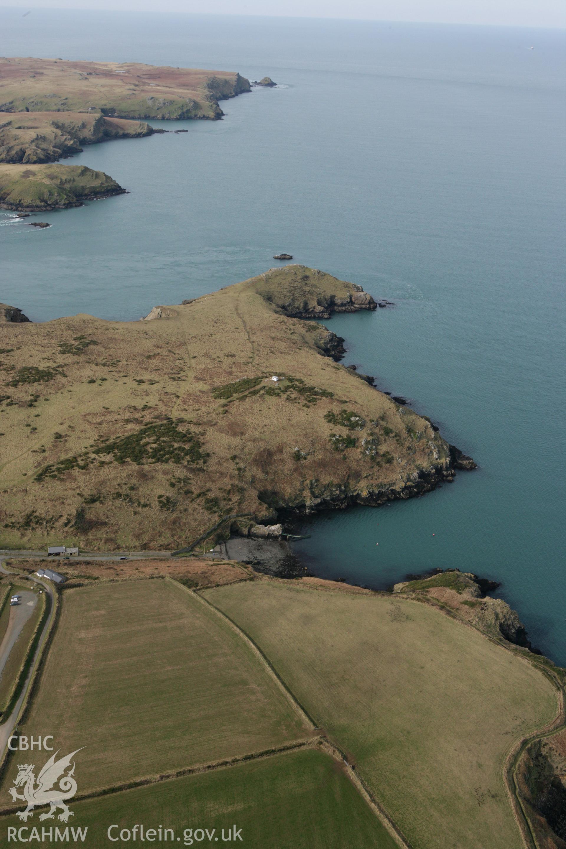 RCAHMW colour oblique aerial photograph of Deer Park Promontory Fort. Taken on 02 March 2010 by Toby Driver