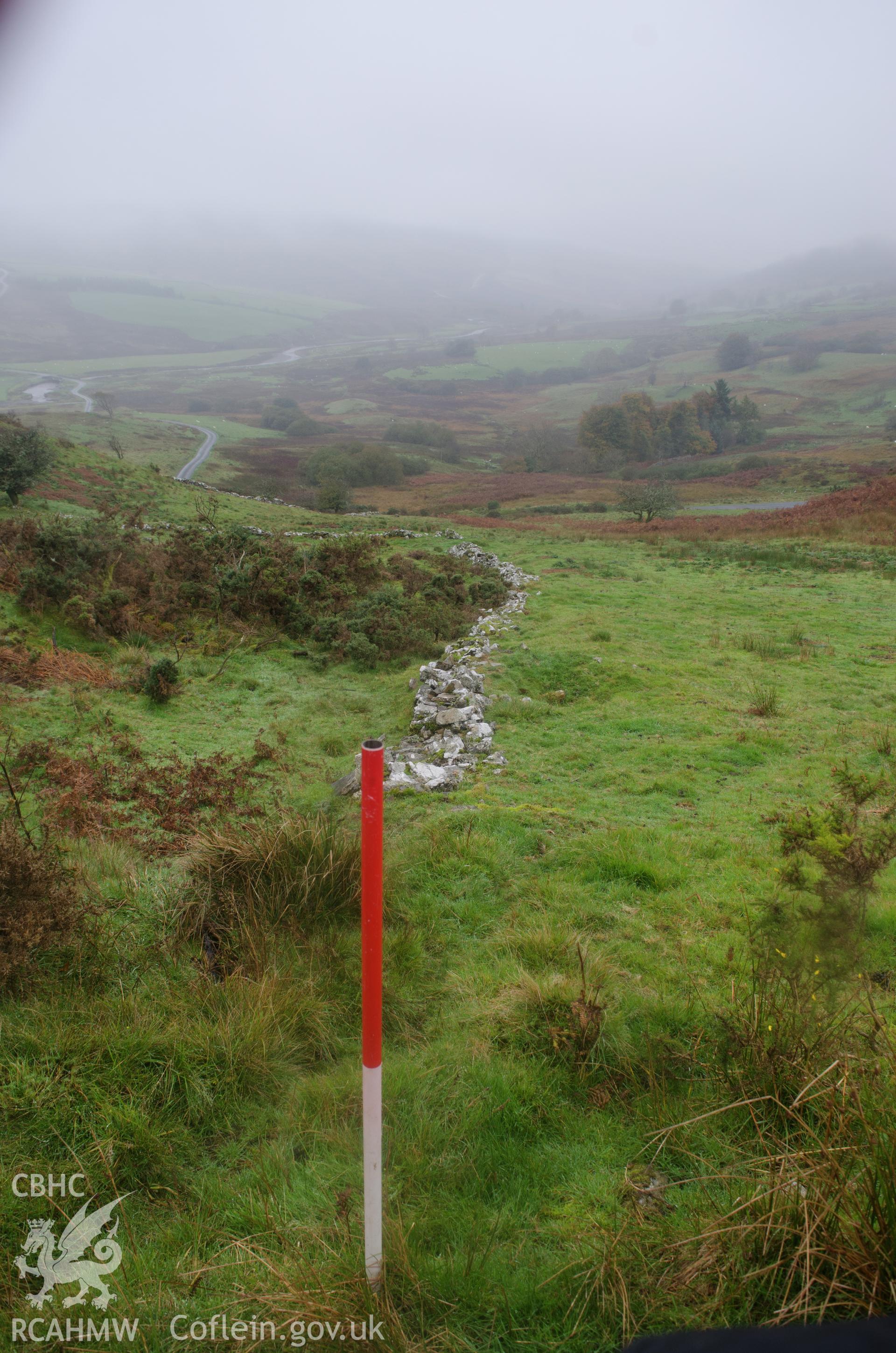 View from the east of a denuded wall at Llyn Gelli-Gain reservoir, Trawsfynydd. Photographed as part of archaeological assessment conducted by Gwynedd Archaeological Trust on 16th October 2018. Project no. 2579.