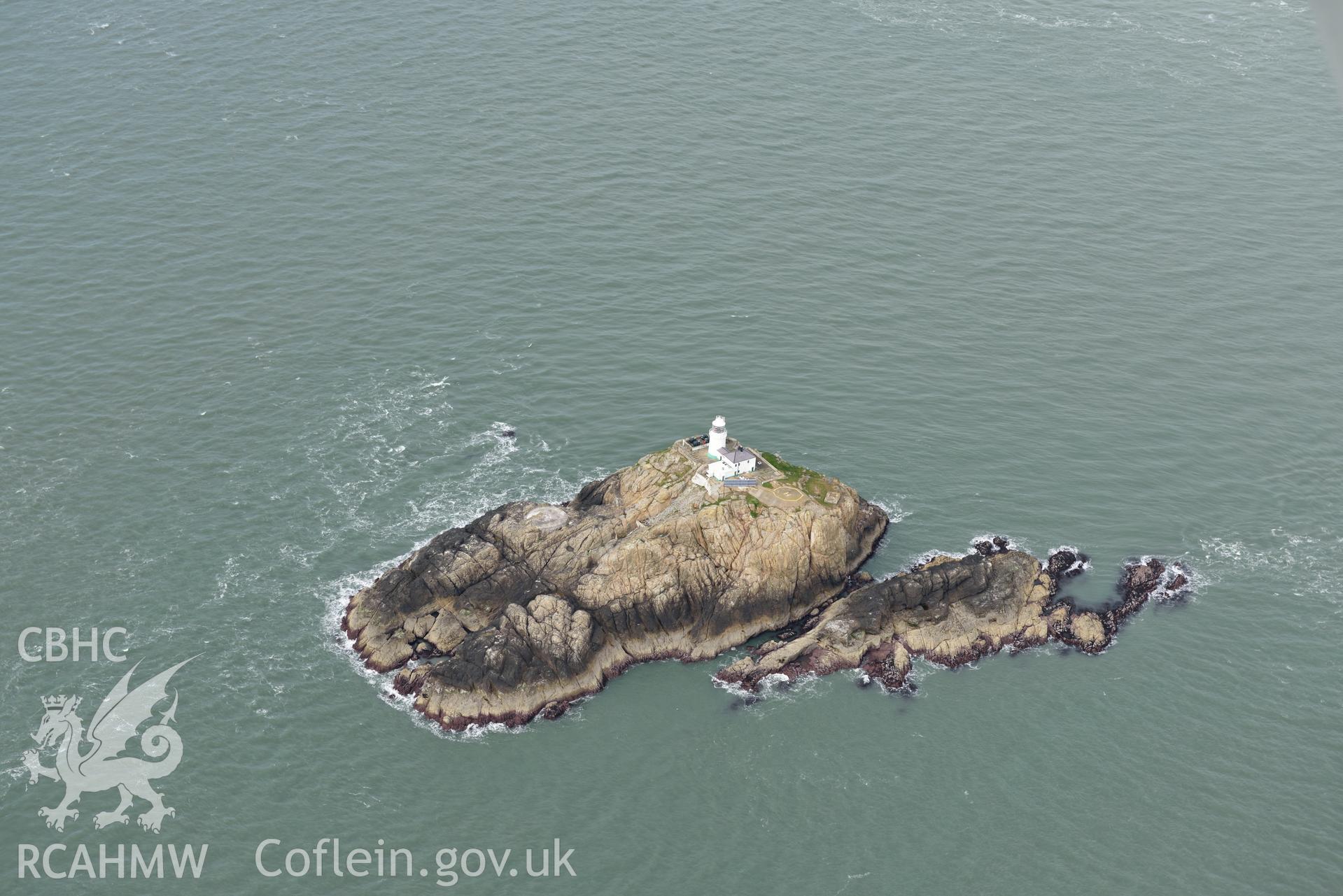 South Bishop Lighthouse at extreme low tide. Baseline aerial reconnaissance survey for the CHERISH Project. ? Crown: CHERISH PROJECT 2017. Produced with EU funds through the Ireland Wales Co-operation Programme 2014-2020. All material made freely available through the Open Government Licence.