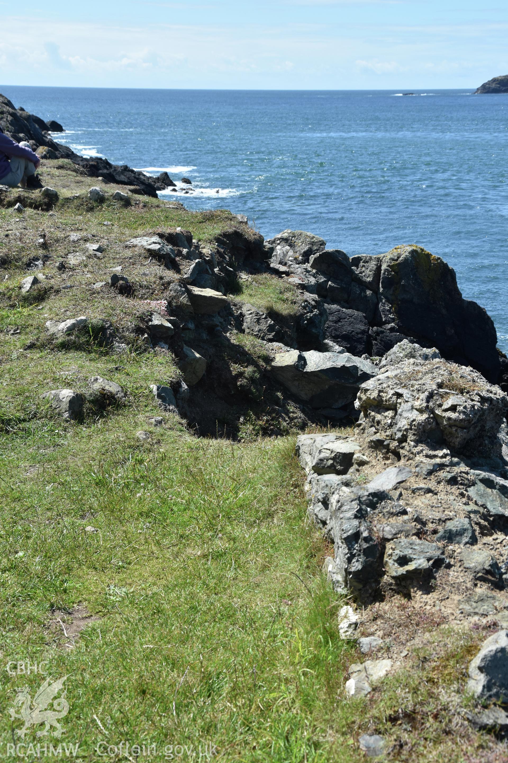 Penmaenmelyn copper mine. View from north of eroding edge of rectangular building.  Investigator?s photographic survey for the CHERISH Project. ? Crown: CHERISH PROJECT 2019. Produced with EU funds through the Ireland Wales Co-operation Programme 2014-2020. All material made freely available through the Open Government Licence.