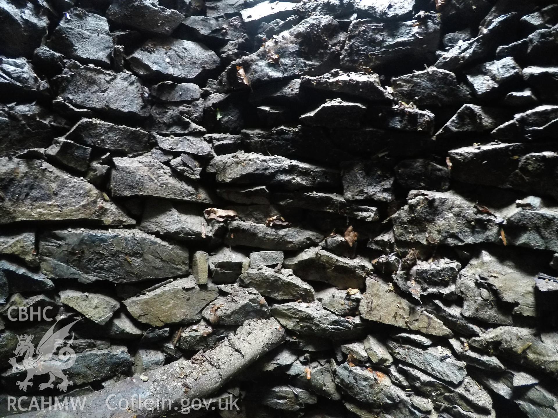 View from the south of well interior at 3.0m depth. Photographed by Gwynedd Archaeological Trust as part of archaeological mitigation report for well at Plas Celynin, Henryd, Conwy, on 1st August 2018. Project no. G2568.