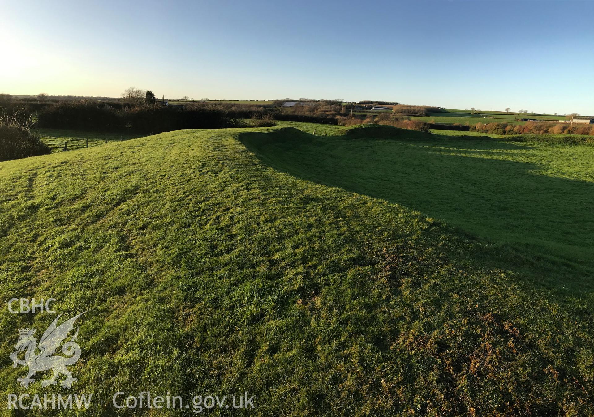 Digital colour photograph showing Castell Bryn Gwyn neolithic henge and later ringwork, Llanidan, taken by Paul Davis on 3rd December 2019.