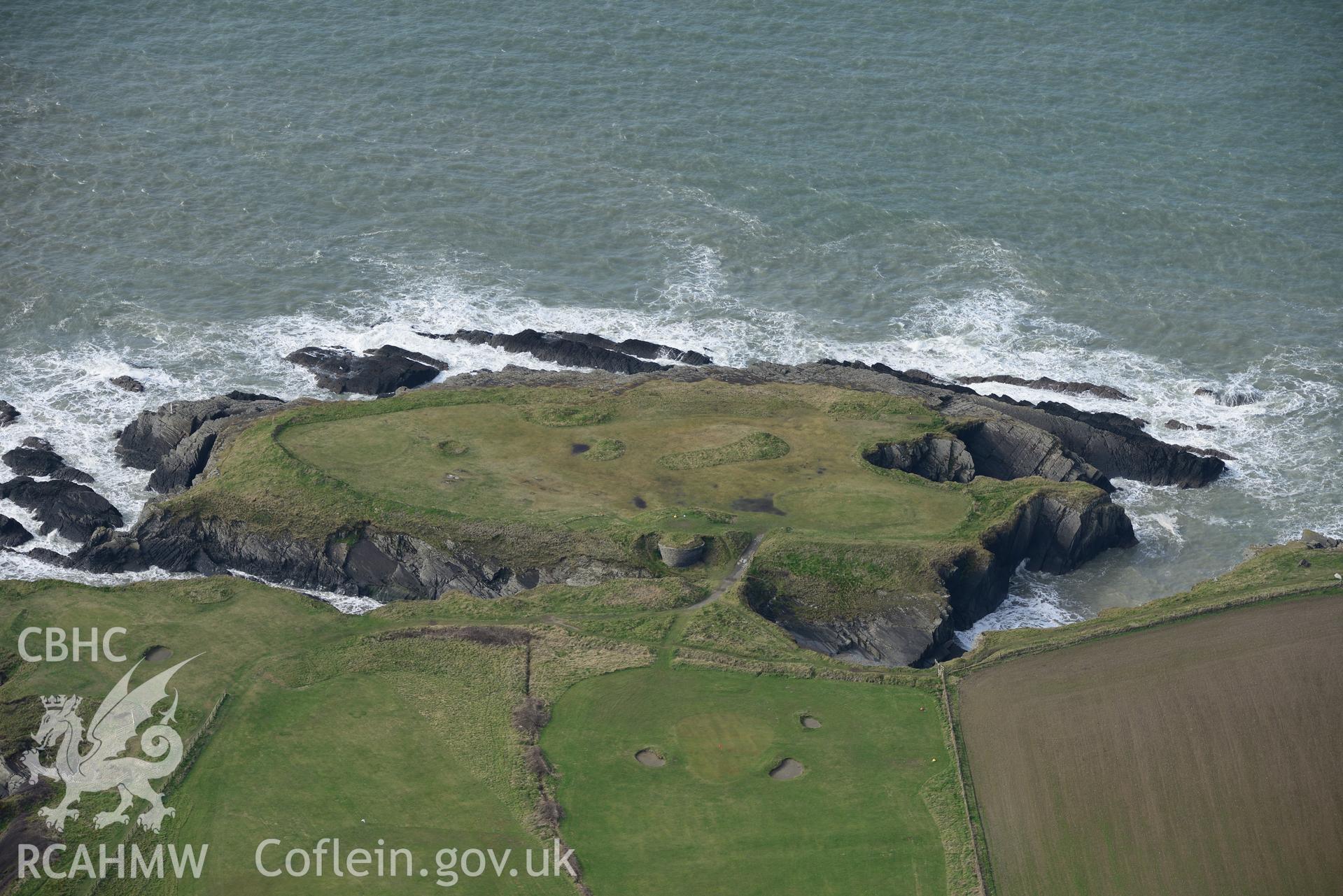 Craig-y-Gwbert and the site of former Craig-y-Gwbert lime kiln, Gwbert, near Cardigan. Oblique aerial photograph taken during the Royal Commission's programme of archaeological aerial reconnaissance by Toby Driver on 13th March 2015.