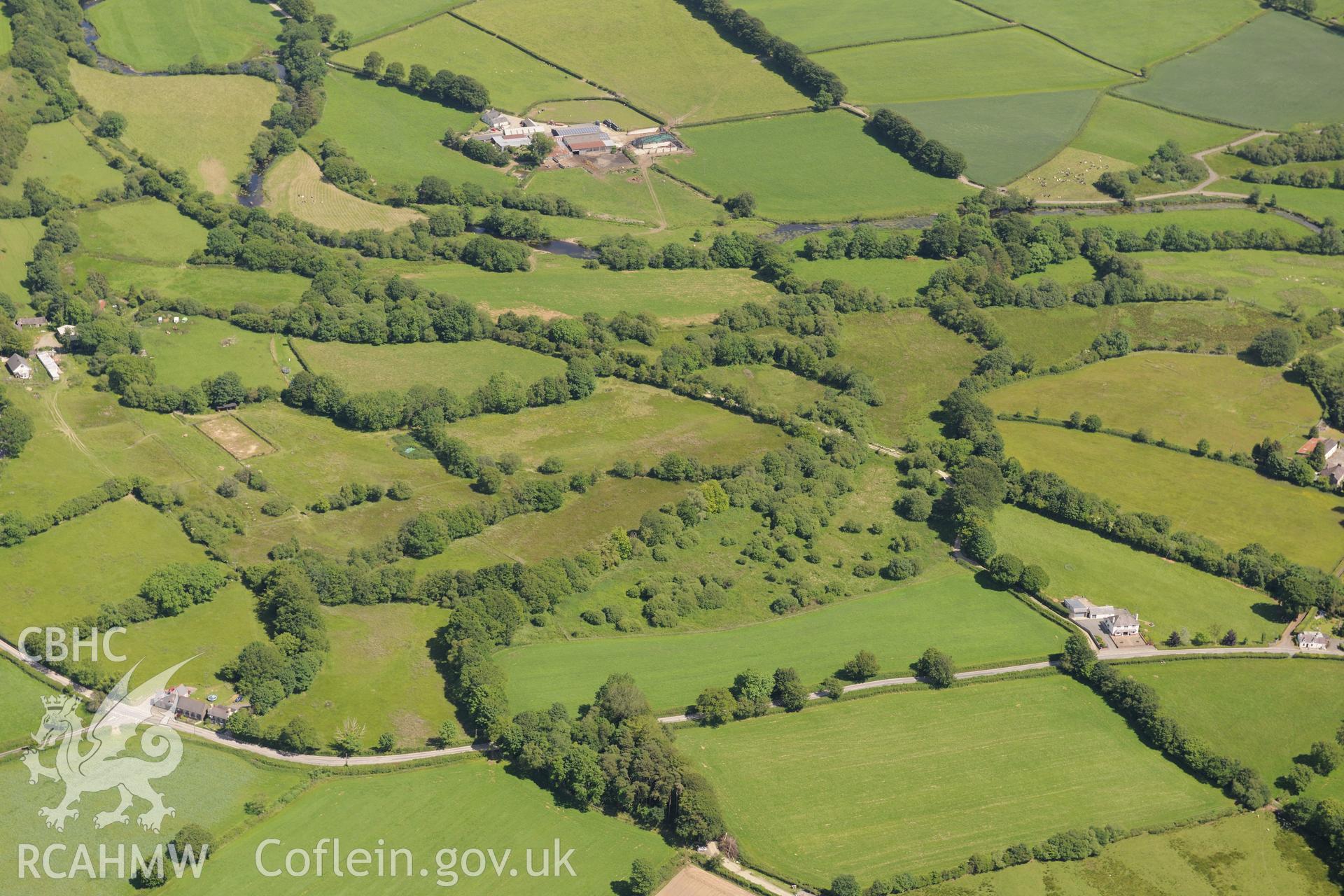 Possible location of Roman shrine where Roman wooden head was discovered in 19th century, north east of Llanddewi Brefi. Oblique aerial photograph taken during Royal Commission?s programme of archaeological aerial reconnaissance by Toby Driver on 30/6/15.