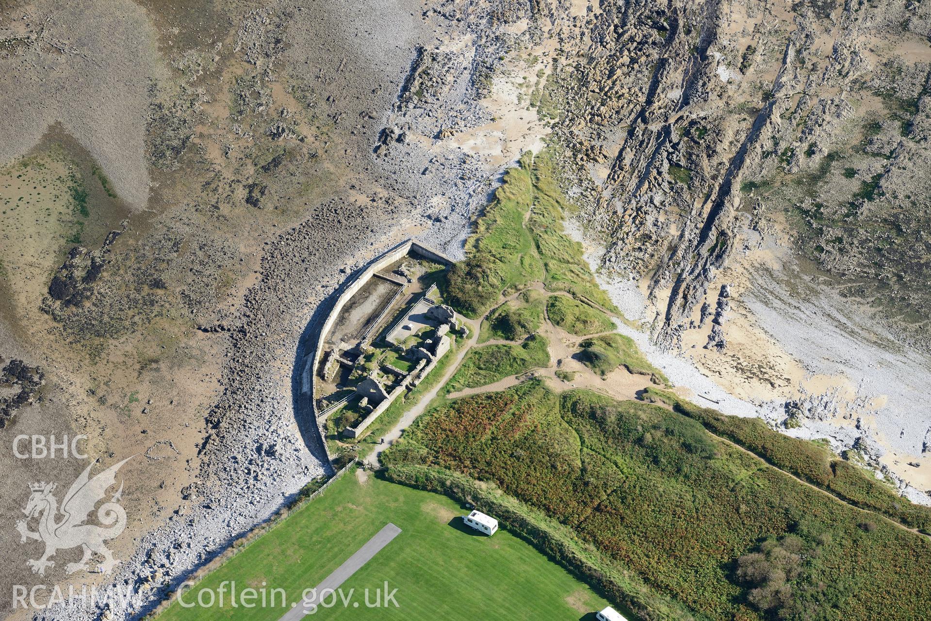 Port Eynon salt house, on the southern shores of the Gower Peninsula at Port Eynon Bay. Oblique aerial photograph taken during the Royal Commission's programme of archaeological aerial reconnaissance by Toby Driver on 30th September 2015.