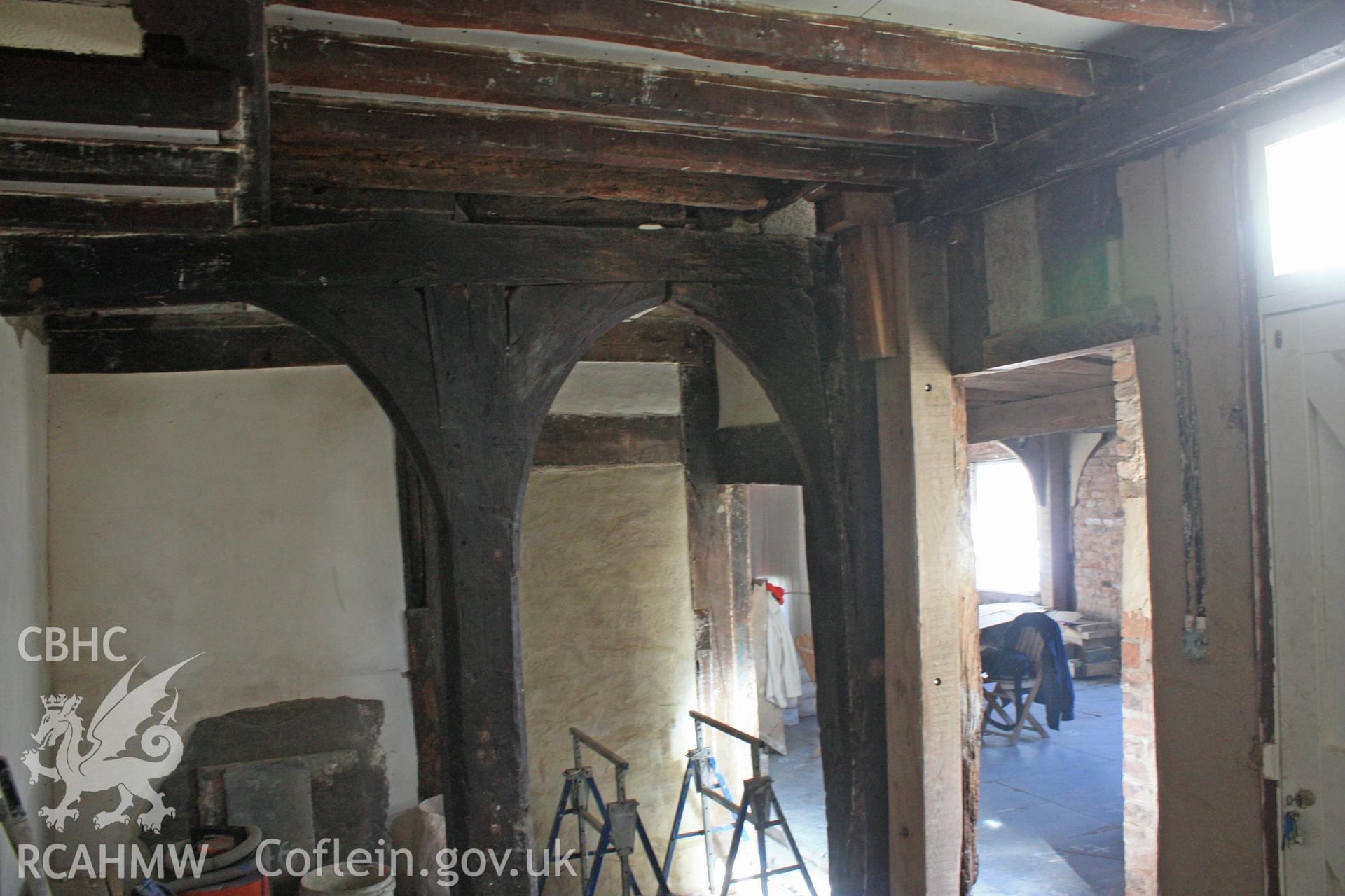 Colour photograph showing detail of 15th century two centred arched doorway at Porth-y-Dwr, 67 Clwyd Street, Ruthin. Photographed during survey conducted by Geoff Ward on 10th June 2013.