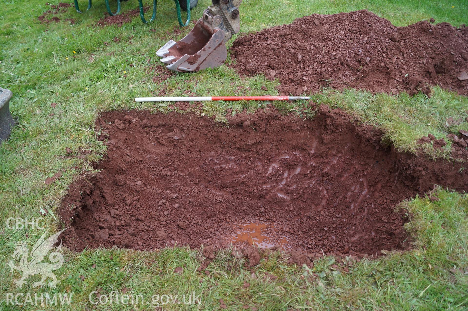 'Soakaway at the northwest end of Trench 2, looking northeast' at Capel Gwynfe, Llangadod. Photograph and description by Jenny Hall and Paul Sambrook of Trysor, May 2018.