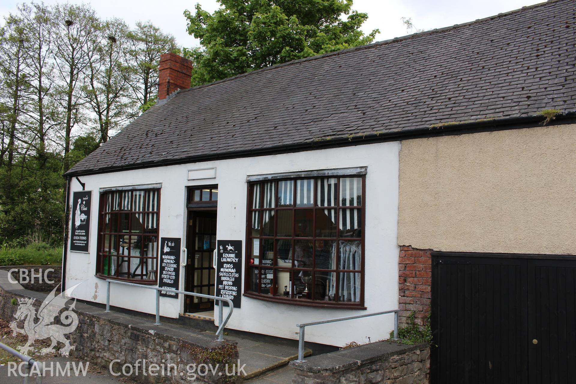 Colour photograph showing exterior view of Touch of Class laundry services at 3 Mwrog Street, Ruthin. Photographed during survey conducted by Geoff Ward on 14th May 2014.