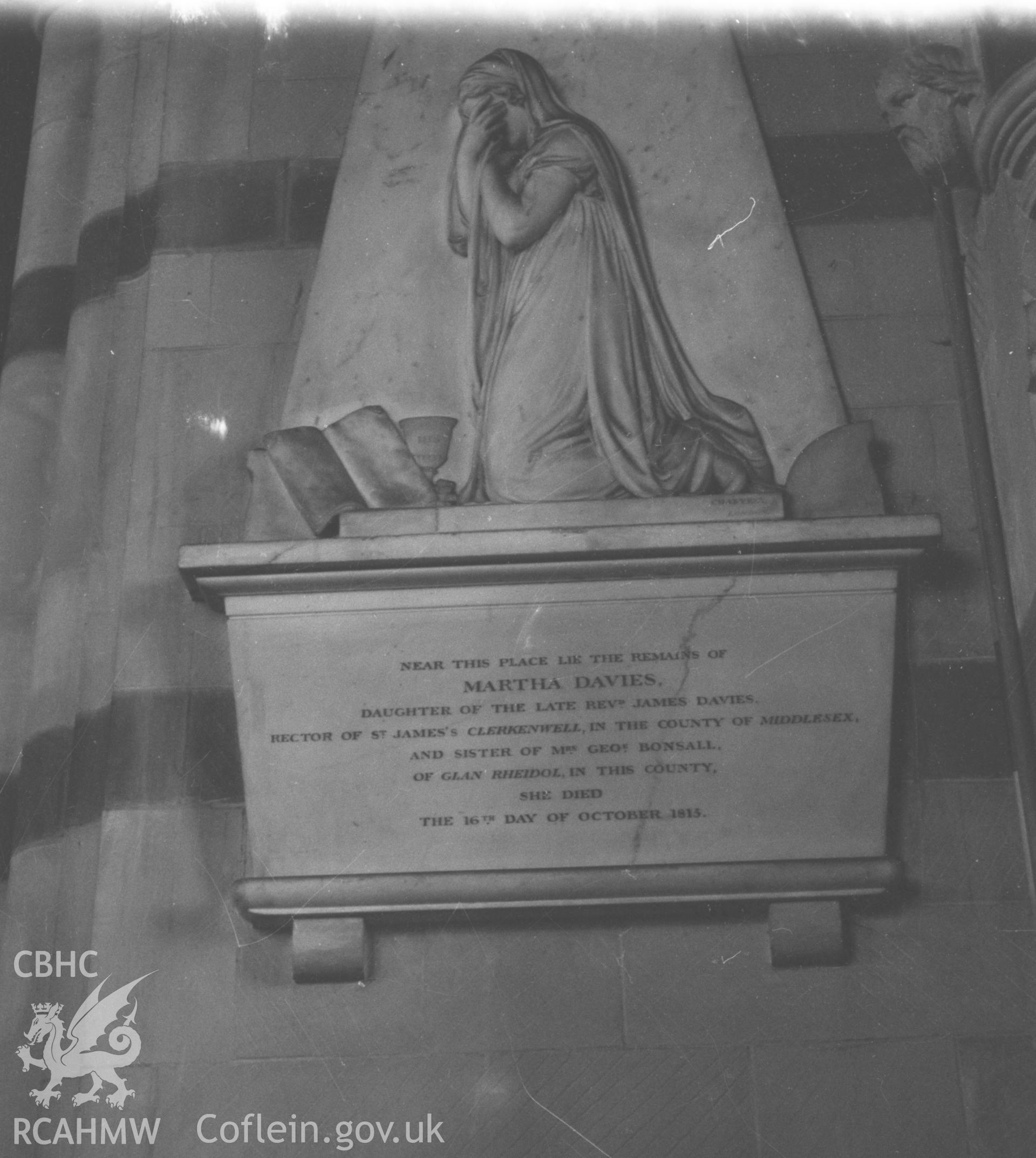 Digital copy of a black and white negative showing 1813 memorial to Martha Davies by chantrey at rear of north aisle of St. Michael's church, Aberystwyth. Photographed by Arthur O. Chater in August 1967.
