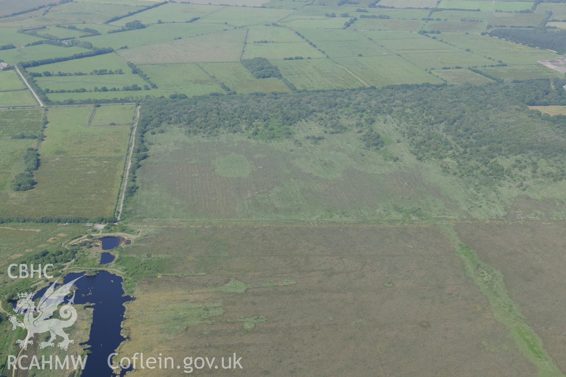 Cors Fochno, or Borth Bog. Oblique aerial photograph taken during the Royal Commission?s programme of archaeological aerial reconnaissance by Toby Driver on 12th July 2013.