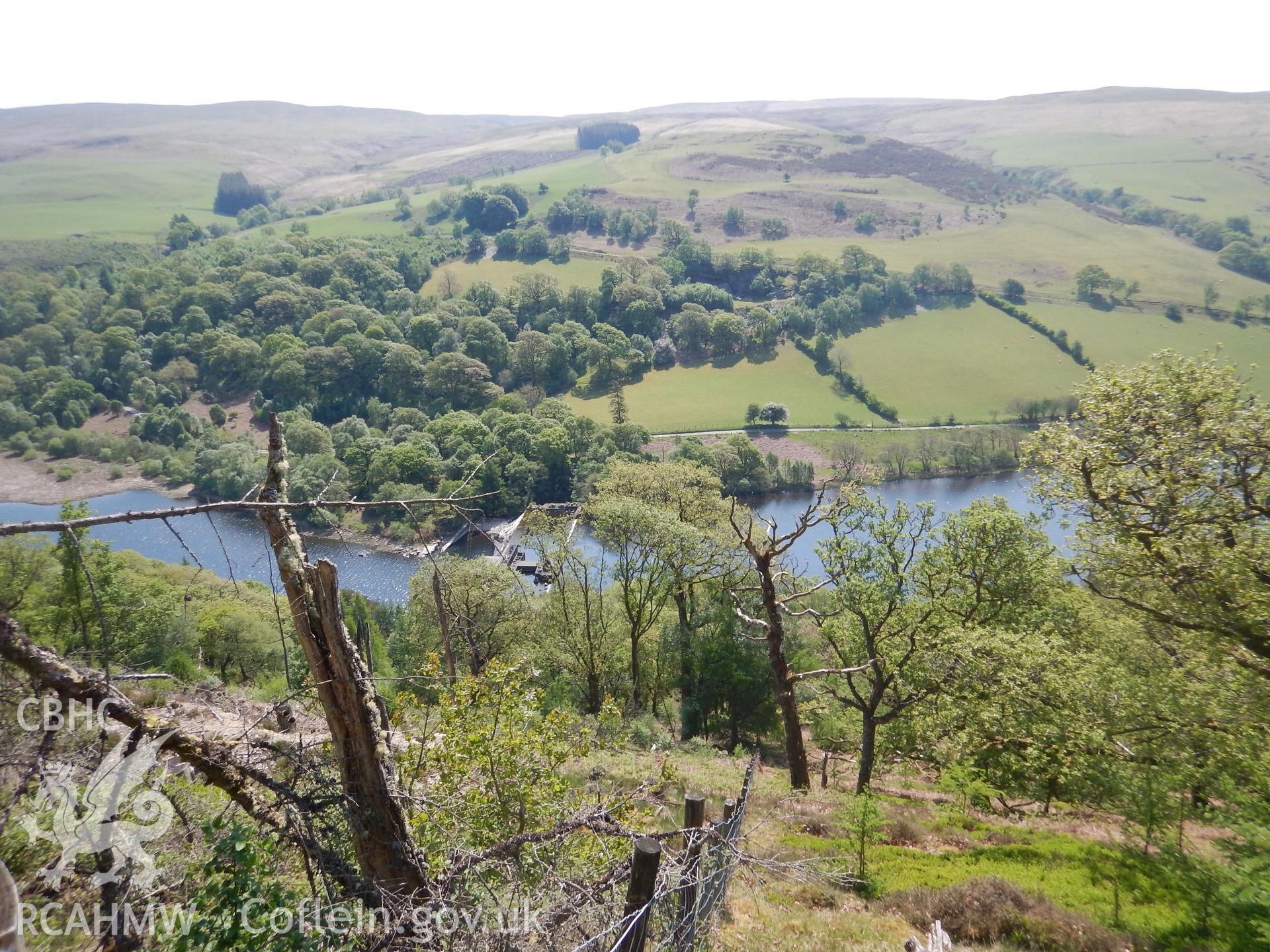 View of the Dolymynach Dam from the proposed cable route, looking south-east. Photographed as part of Archaeological Desk Based Assessment of Afon Claerwen, Elan Valley, Rhayader, Powys. Assessment conducted by Archaeology Wales in 2018. Report no. 1681.