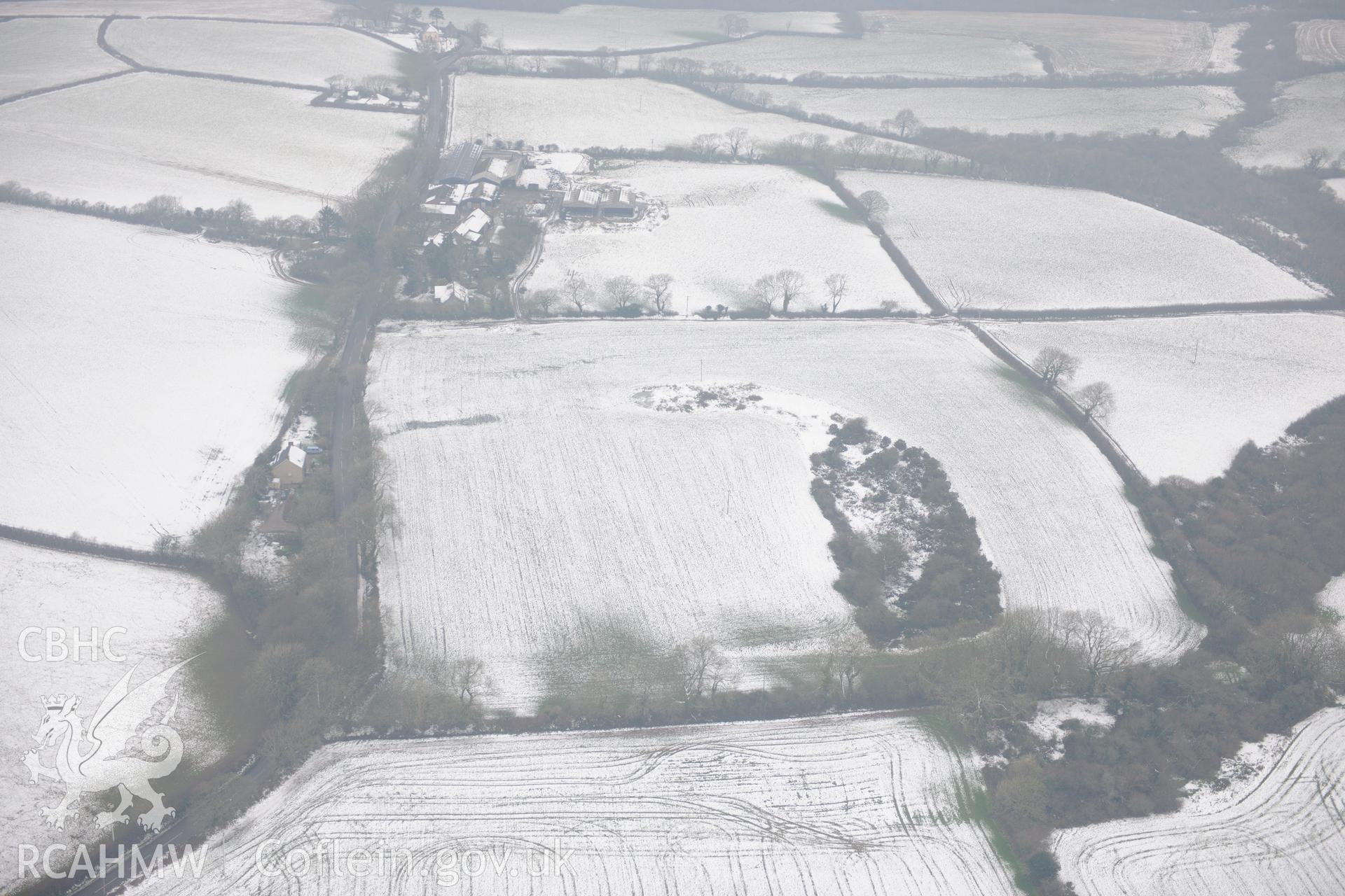 Wiston Roman Fort, north east of Haverfordwest. Oblique aerial photograph taken during the Royal Commission?s programme of archaeological aerial reconnaissance by Toby Driver on 24th January 2013.