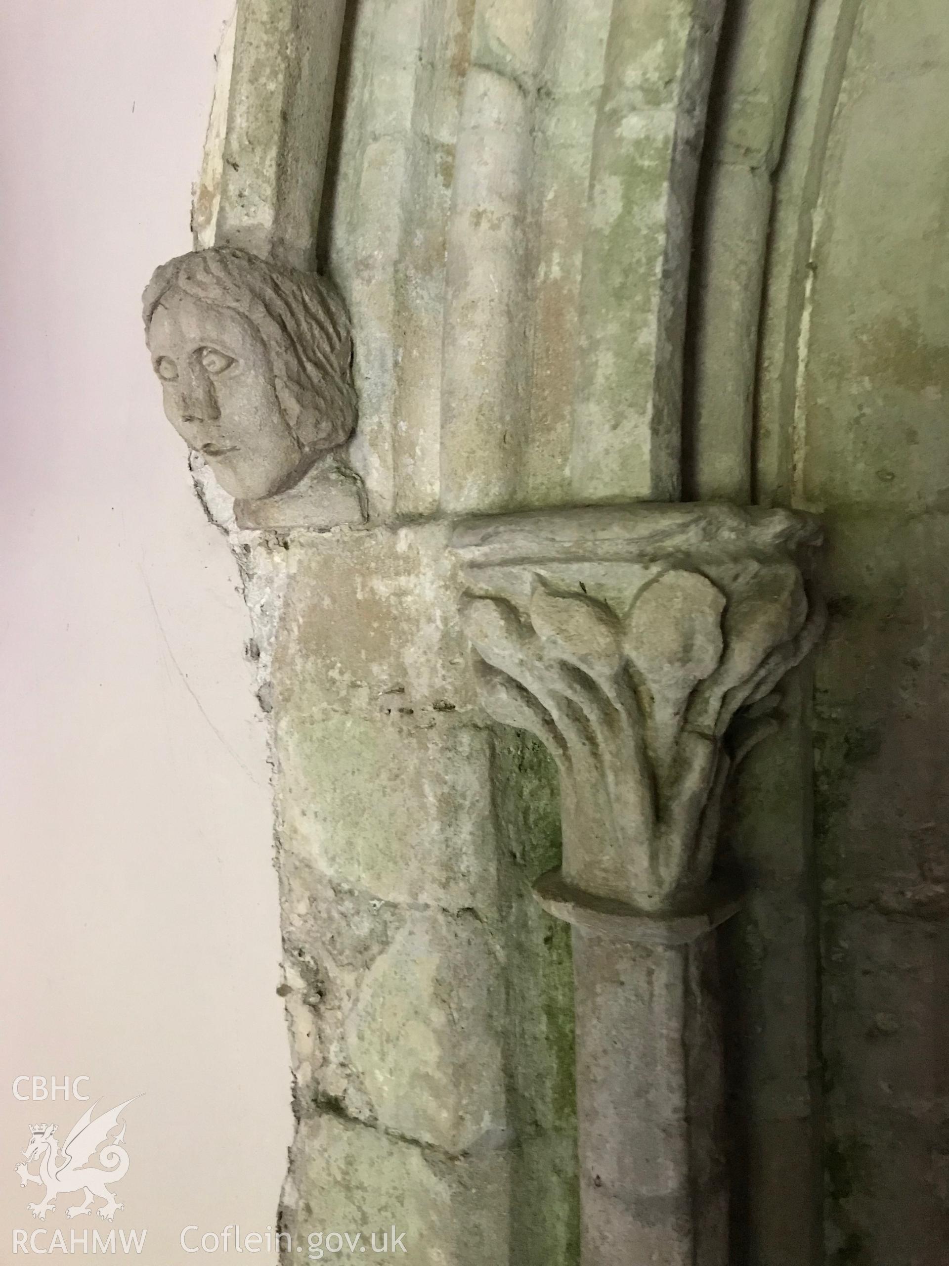 Colour photo showing carved detail of archway at St. Cadog's Church, Cheriton, taken by Paul R. Davis, 19th May 2018.