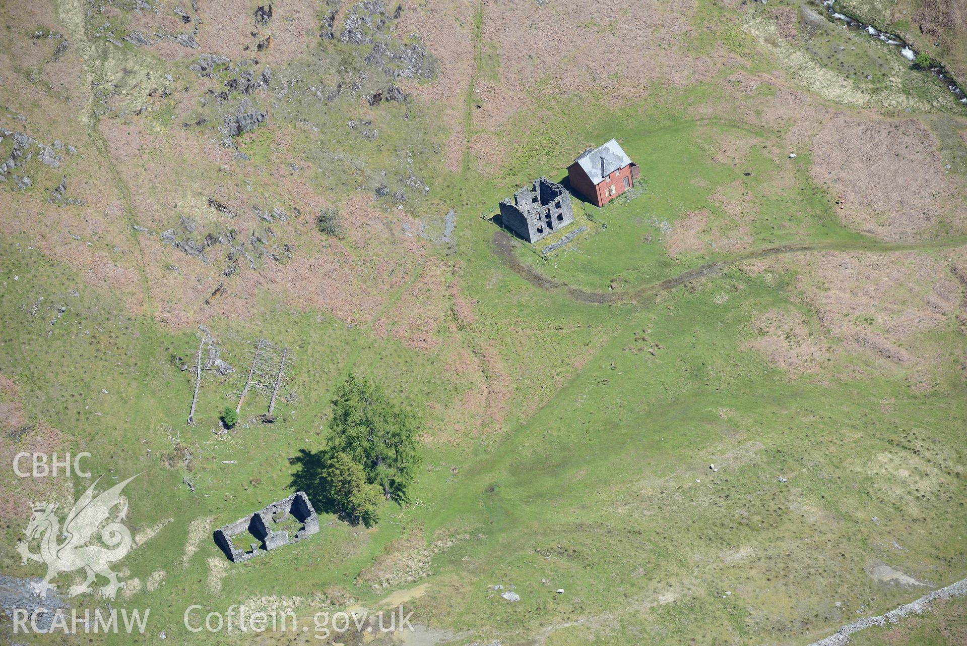 Cwm Elan lead mine complex, including the remains of Cwm Elan mine house, and Pengwaidd house and office. Oblique aerial photograph taken during the Royal Commission's programme of archaeological aerial reconnaissance by Toby Driver on 3rd June 2015.