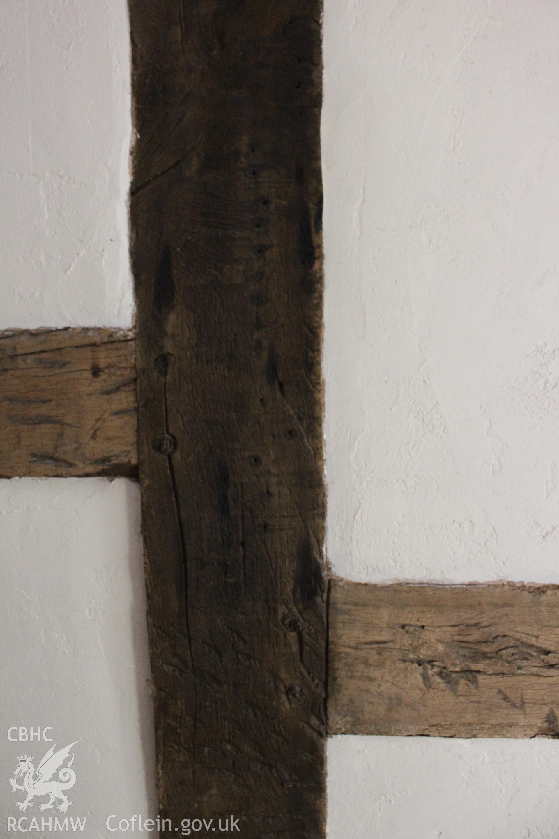 Colour photograph showing detail of detail of timber frame at 5-7 Mwrog Street, Ruthin. Photographed during survey conducted by Geoff Ward on 14th May 2014.
