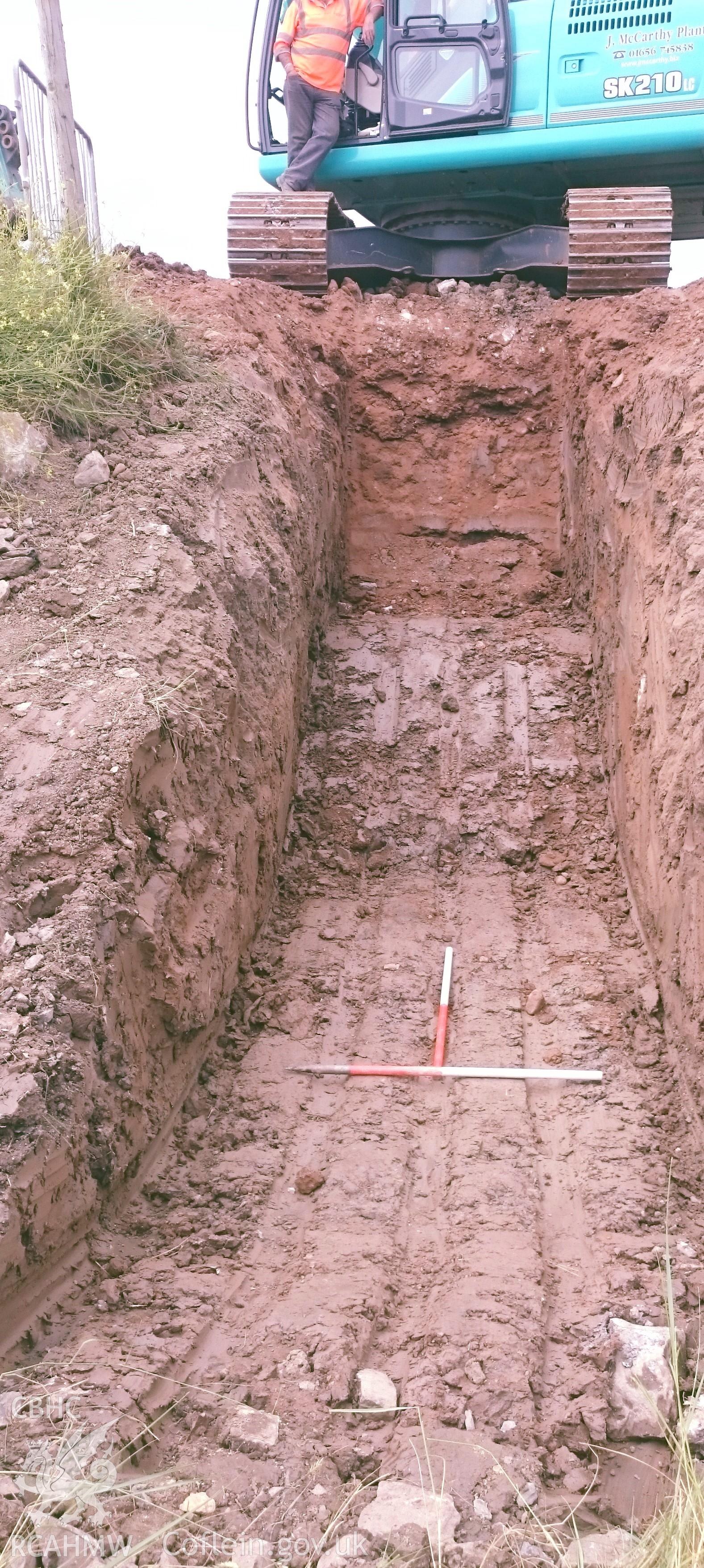 Digital colour photograph showing 'Trench 3, view to North.' Photographed as part of Archaeological Watching Brief of Portlands Ground, Magor, Monmouthshire, carried out by Archaeology Wales, 2016.