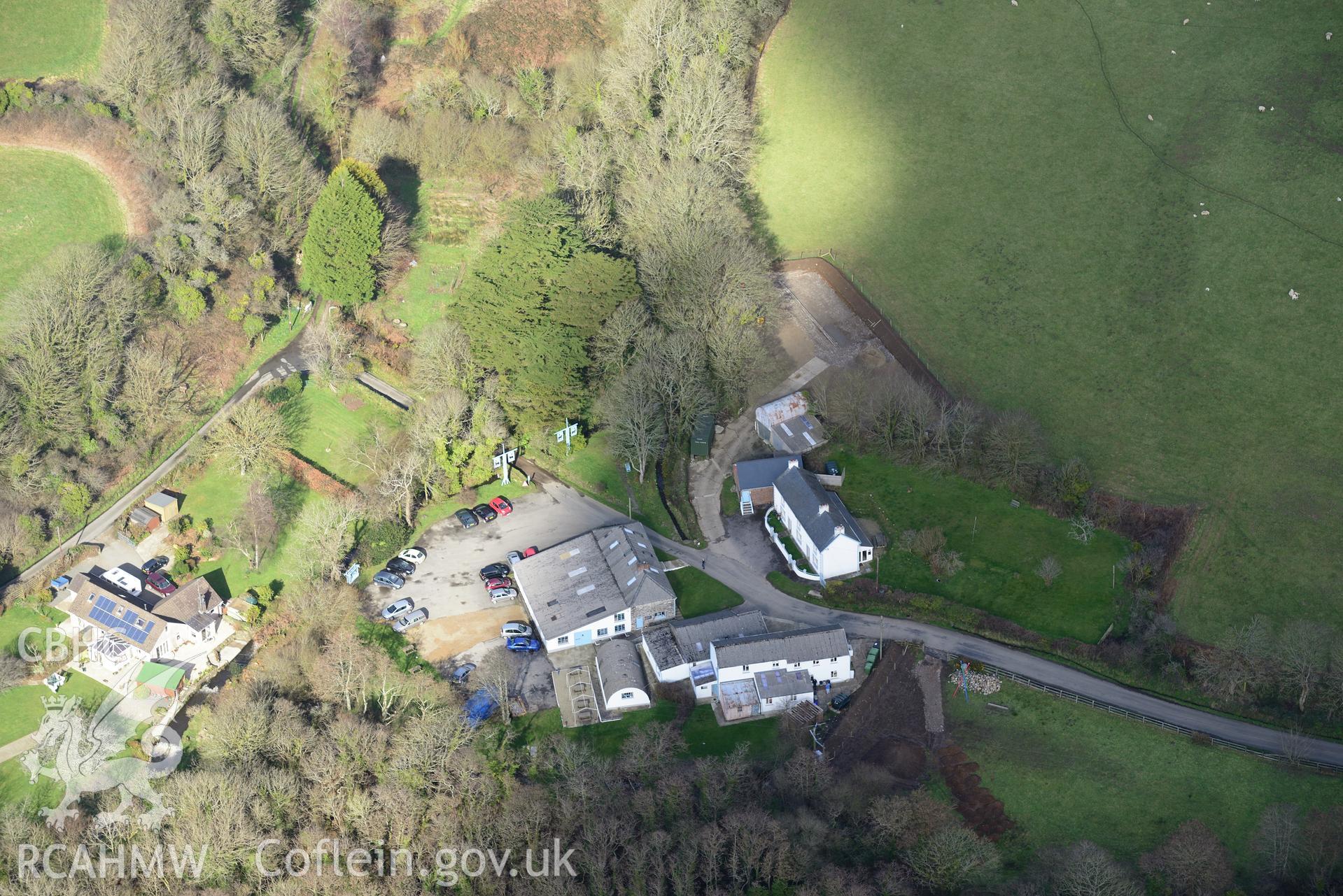 Melin Tregwynt woollen mill and Tre-Gwynt garden, Tremarchog, near Fishguard. Oblique aerial photograph taken during the Royal Commission's programme of archaeological aerial reconnaissance by Toby Driver on 13th March 2015.