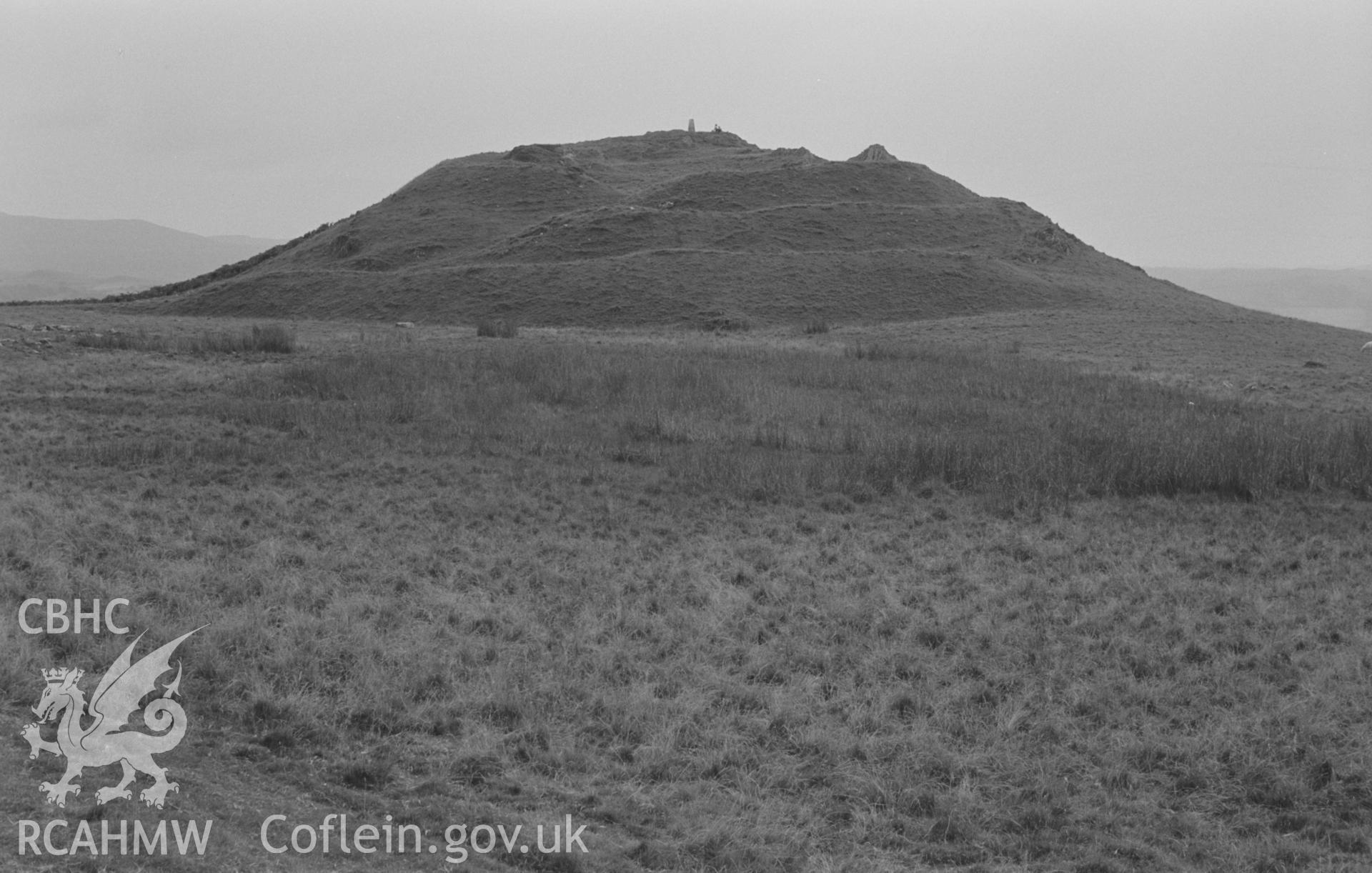 Digital copy of a black and white negative showing view of Pen-y-Bannau iron age camp, Pontrhydfendigaid. Photographed by Arthur O. Chater on 25th August 1967 looking south south west from Grid Reference SN 743 671.