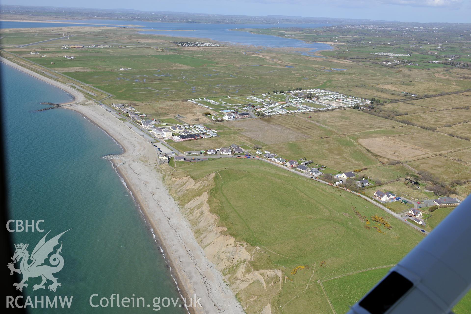 Dinas Dinlle hillfort and village, Llandwrog. Oblique aerial photograph taken during the Royal Commission?s programme of archaeological aerial reconnaissance by Toby Driver on 1st May 2013.