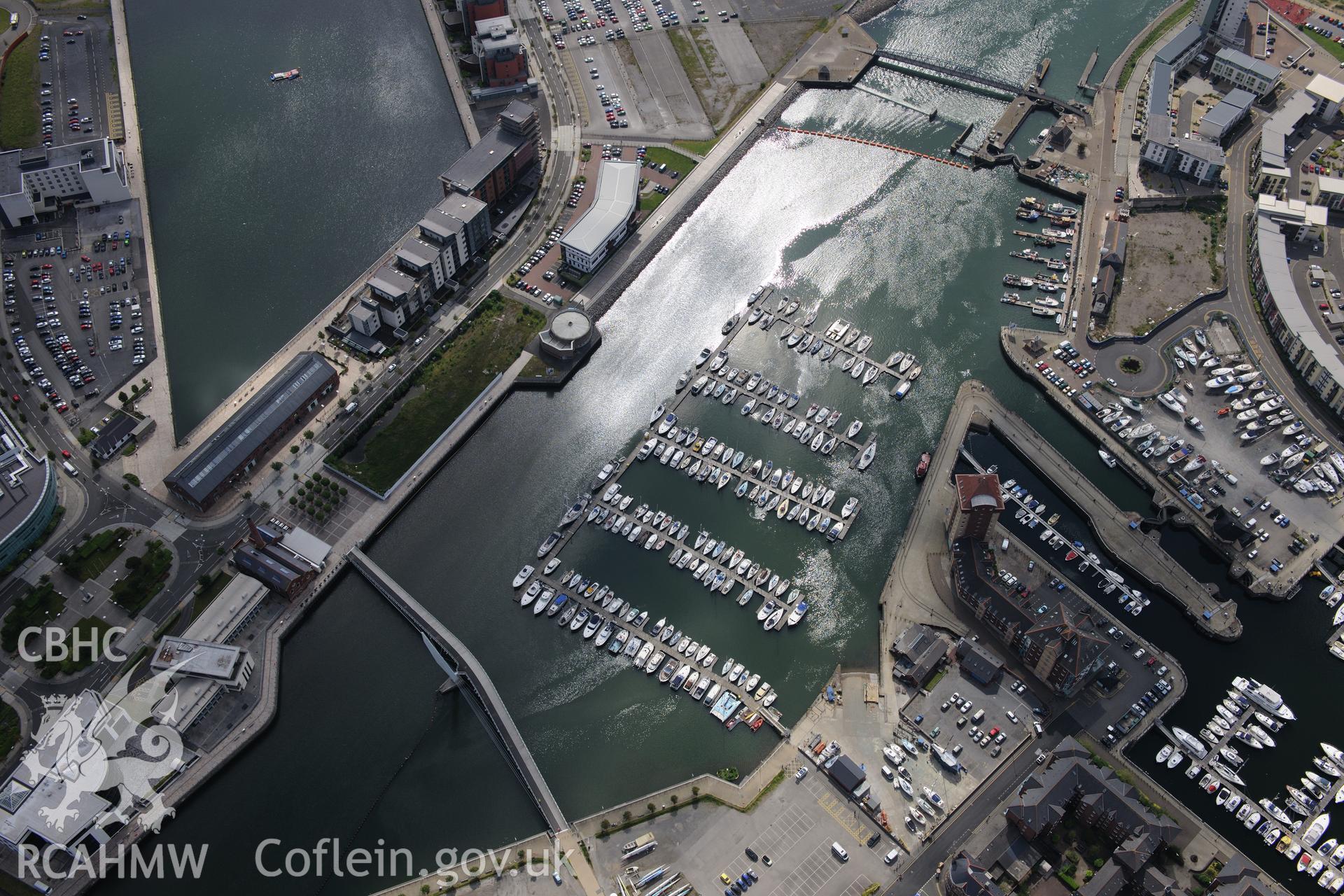 The Marine Quarter and the Prince of Wales dock at Swansea docks. Oblique aerial photograph taken during the Royal Commission's programme of archaeological aerial reconnaissance by Toby Driver on 19th June 2015.