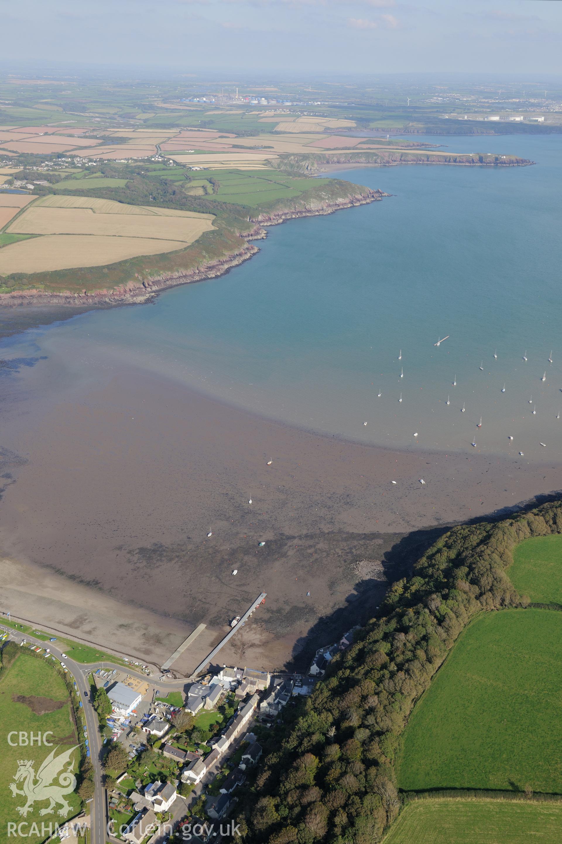 The village of Dale and its landing place on the Pembrokeshire coast, west of Milford Haven. Oblique aerial photograph taken during Royal Commission's programme of archaeological aerial reconnaissance by Toby Driver on 30th September 2015.