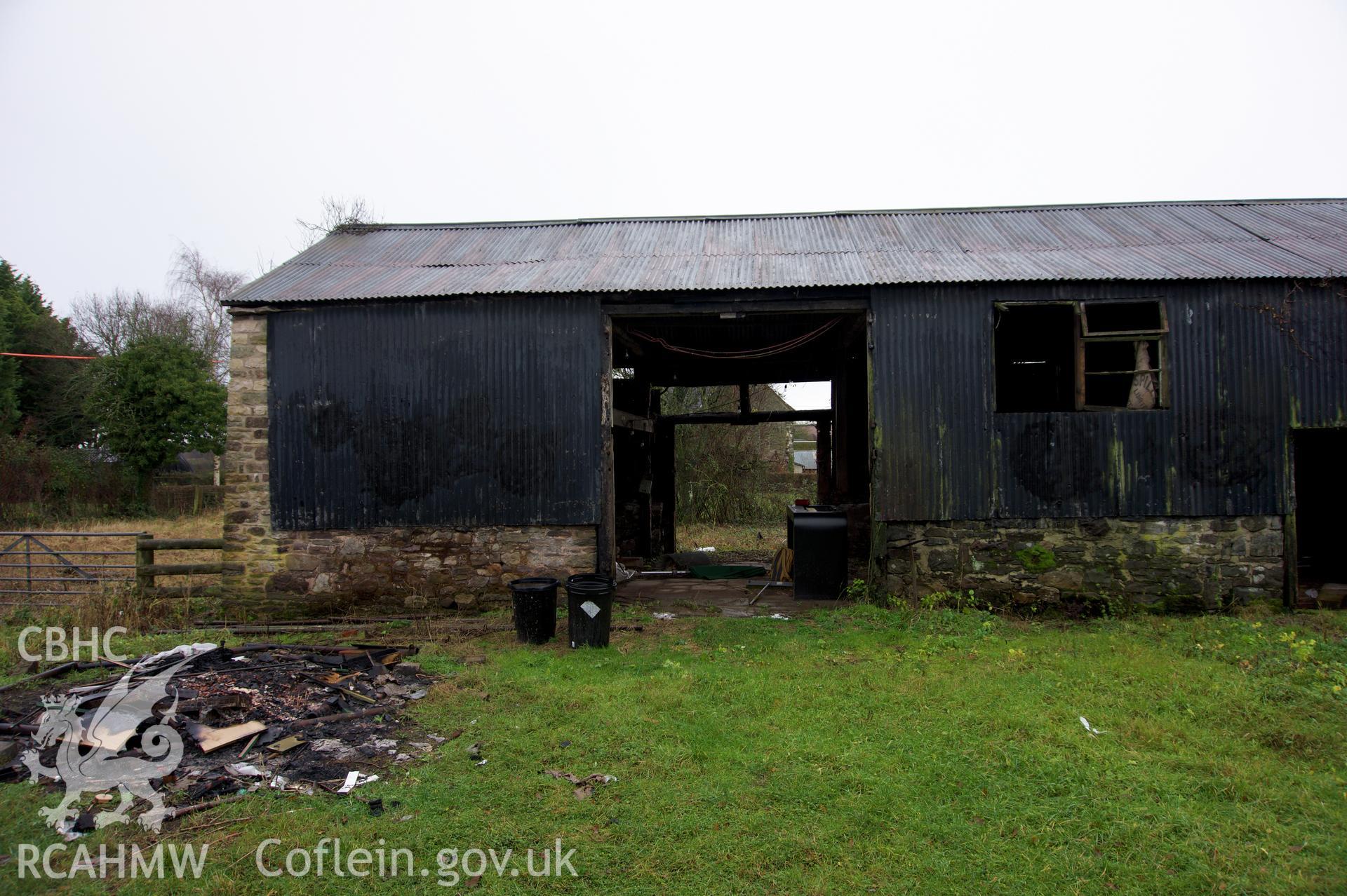 Eastern part of the north elevation of Middle Ton Threshing Barn. Photographed for the Historic Building Photographic Record of Middle Ton Threshing Barn, Llanvapley, by Dan Courtney of Cog Architects, 2019.