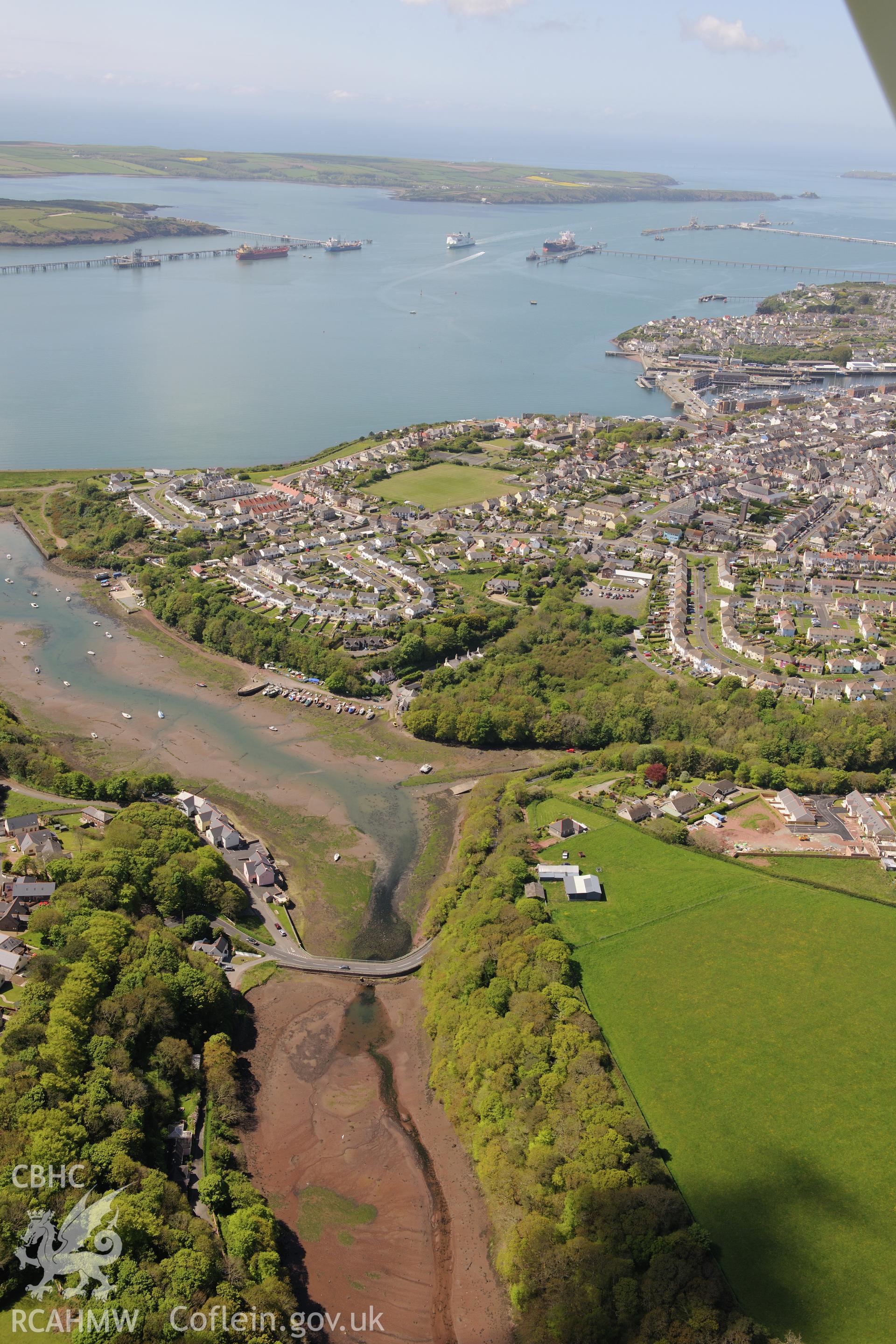 Milford Haven, Pembrokeshire. Oblique aerial photograph taken during the Royal Commission's programme of archaeological aerial reconnaissance by Toby Driver on 13th May 2015.