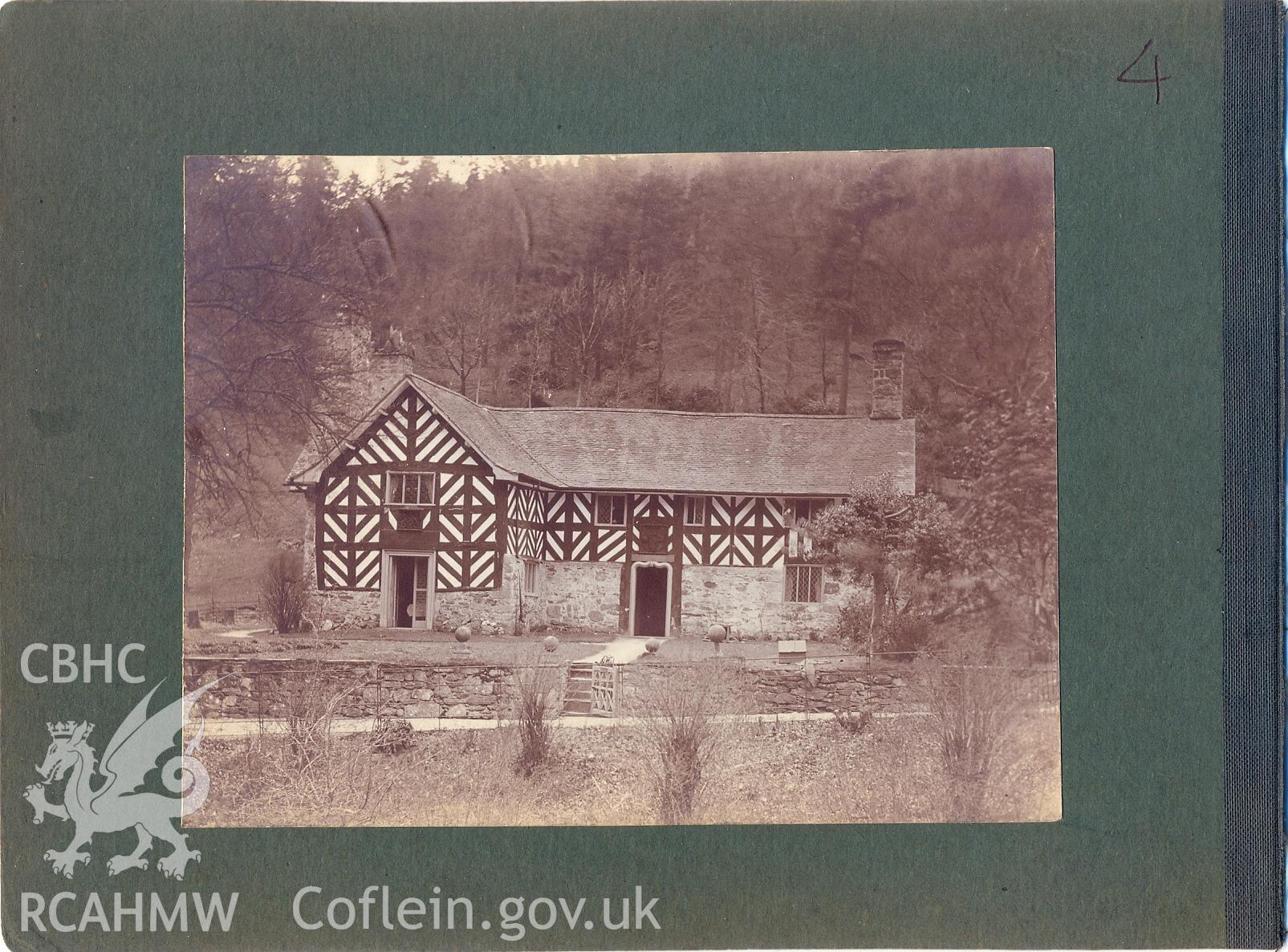 Digital copy of a page from a family album inherited by David Redhead, featuring main elevation view of Plas Uchaf showing coat of arms, dated 1908-1911.