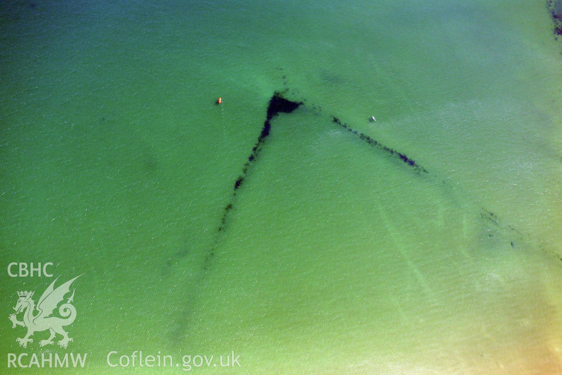 Oxwich Bay Fish Traps 1 and 2, on the southern coast of the Gower Peninsula. Oblique aerial photograph taken during the Royal Commission?s programme of archaeological aerial reconnaissance by Toby Driver on 16th July 2013.