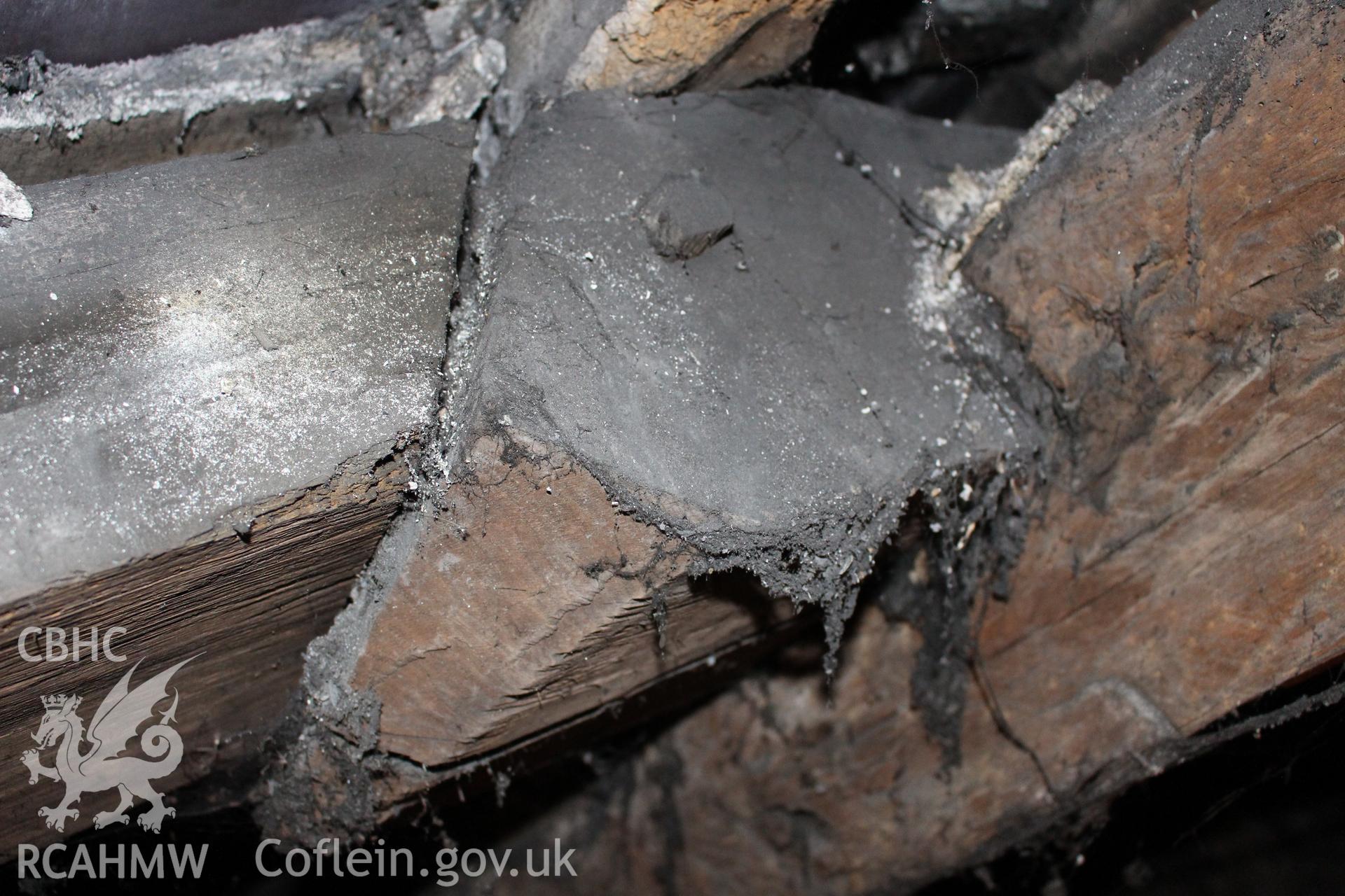 Colour photograph showing detail of timber frame joinery in attic at 5 to 7 Mwrog Street, Ruthin. Photographed during survey conducted by Geoff Ward on 30th May 2014.