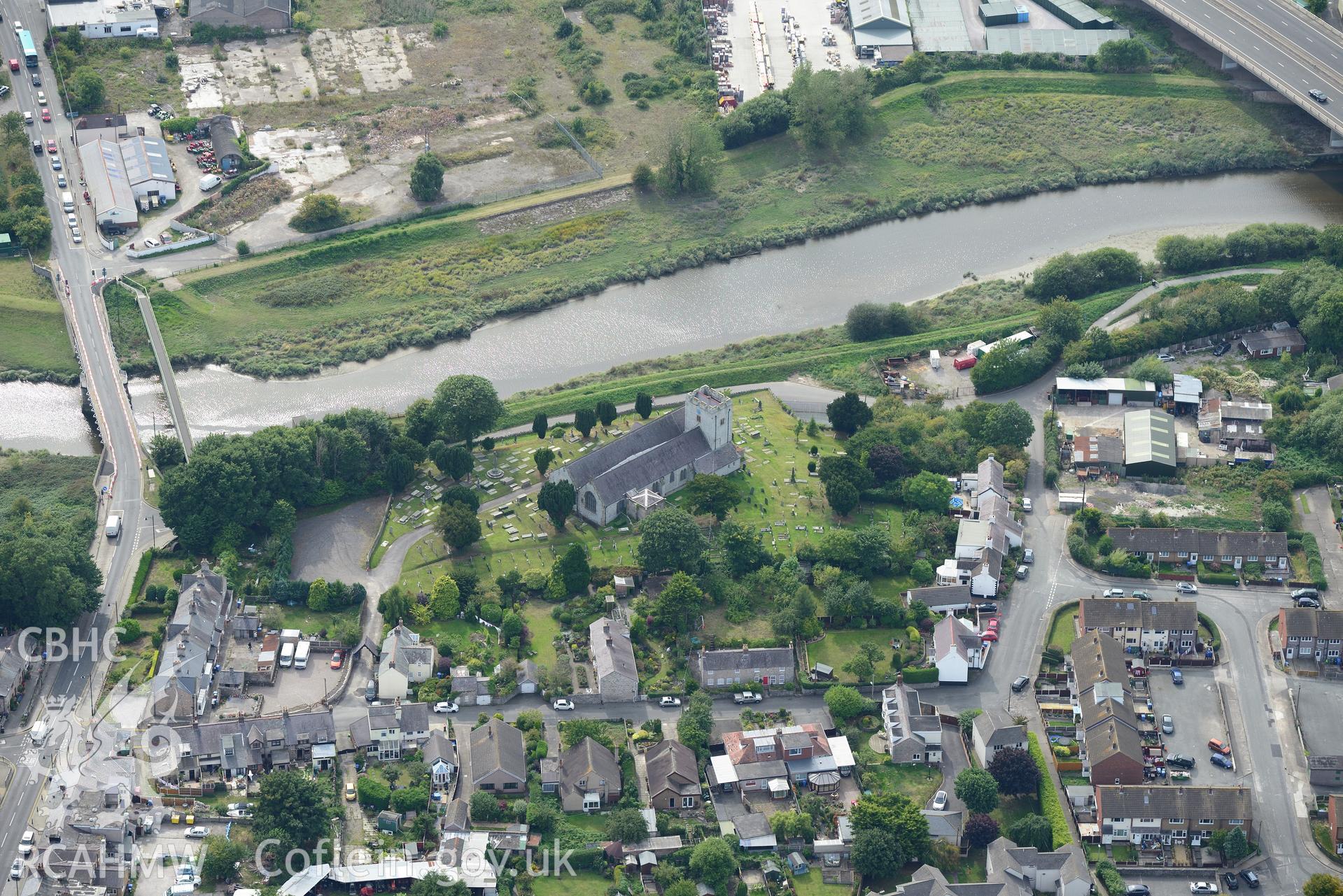 St. Mary's church and Rhuddlan bridge, Rhuddlan. Oblique aerial photograph taken during the Royal Commission's programme of archaeological aerial reconnaissance by Toby Driver on 11th September 2015.