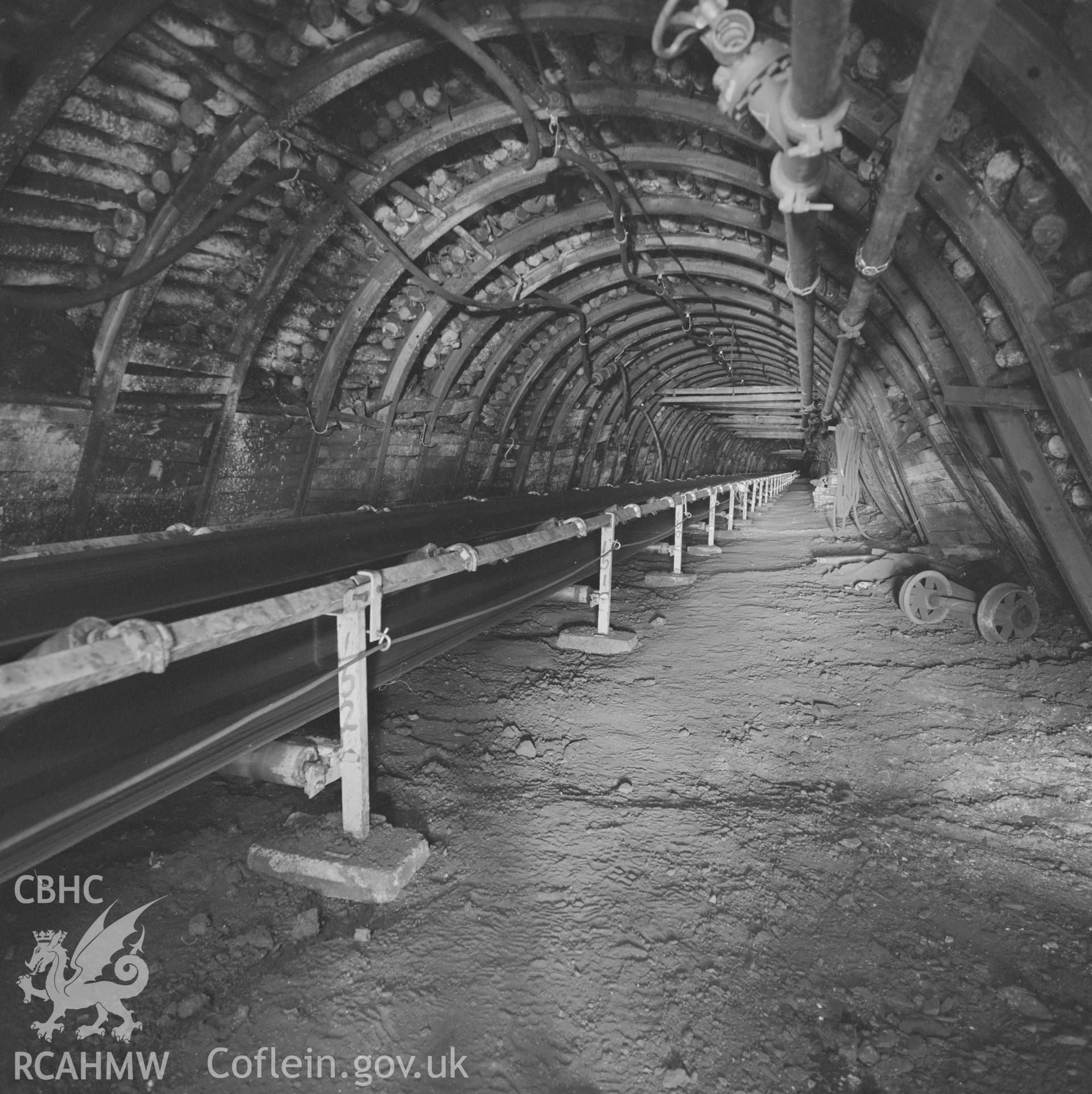 Digital copy of an acetate negative showing main trunk road with conveyor at Marine Colliery, from the John Cornwell Collection.