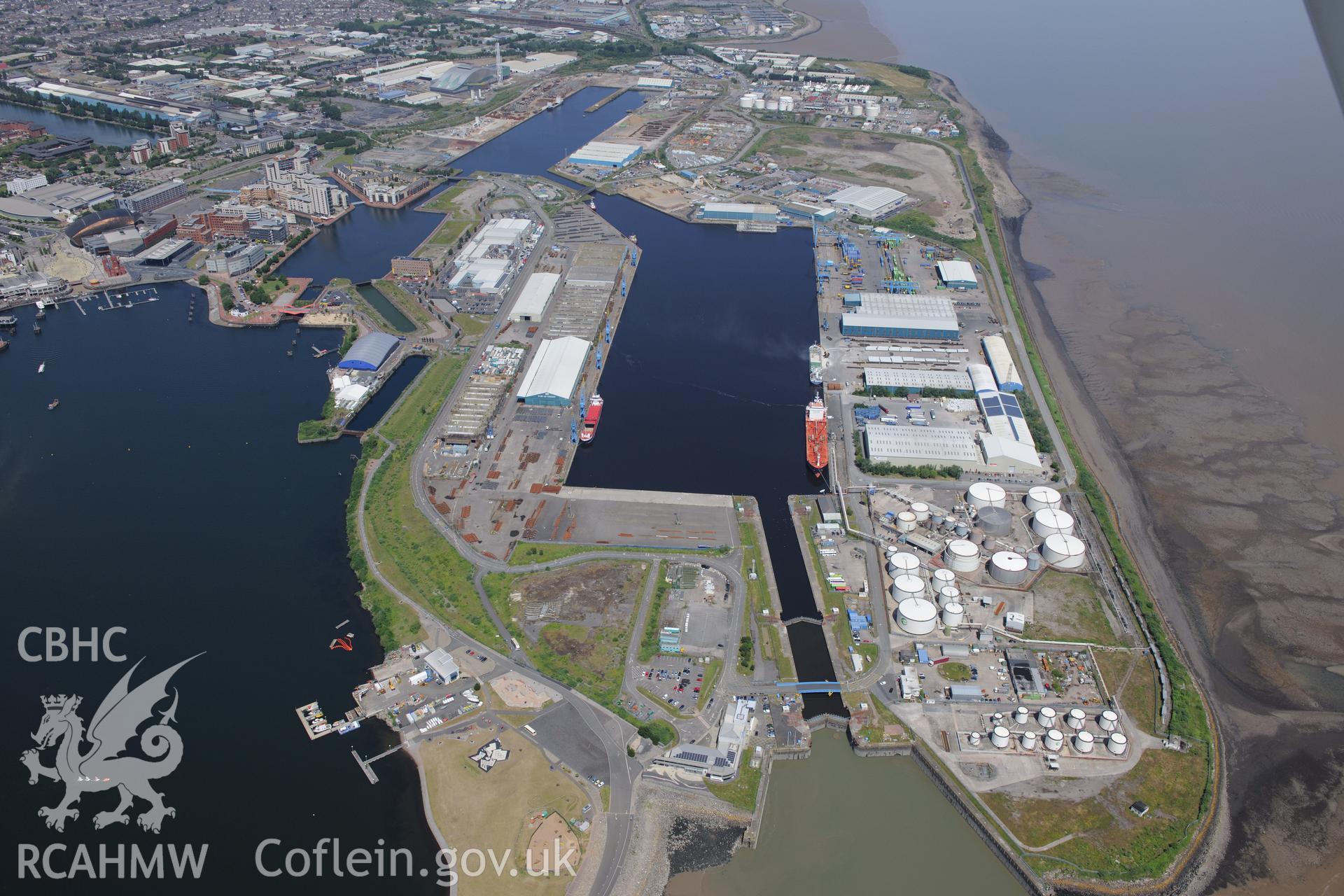 Multi-sports facility; Doctor Who Experience; Oil Terminal and Queen Alexandra Docks, Cardiff Docks, Cardiff Bay. Oblique aerial photograph taken during the Royal Commission?s programme of archaeological aerial reconnaissance by Toby Driver on 29/06/2015.
