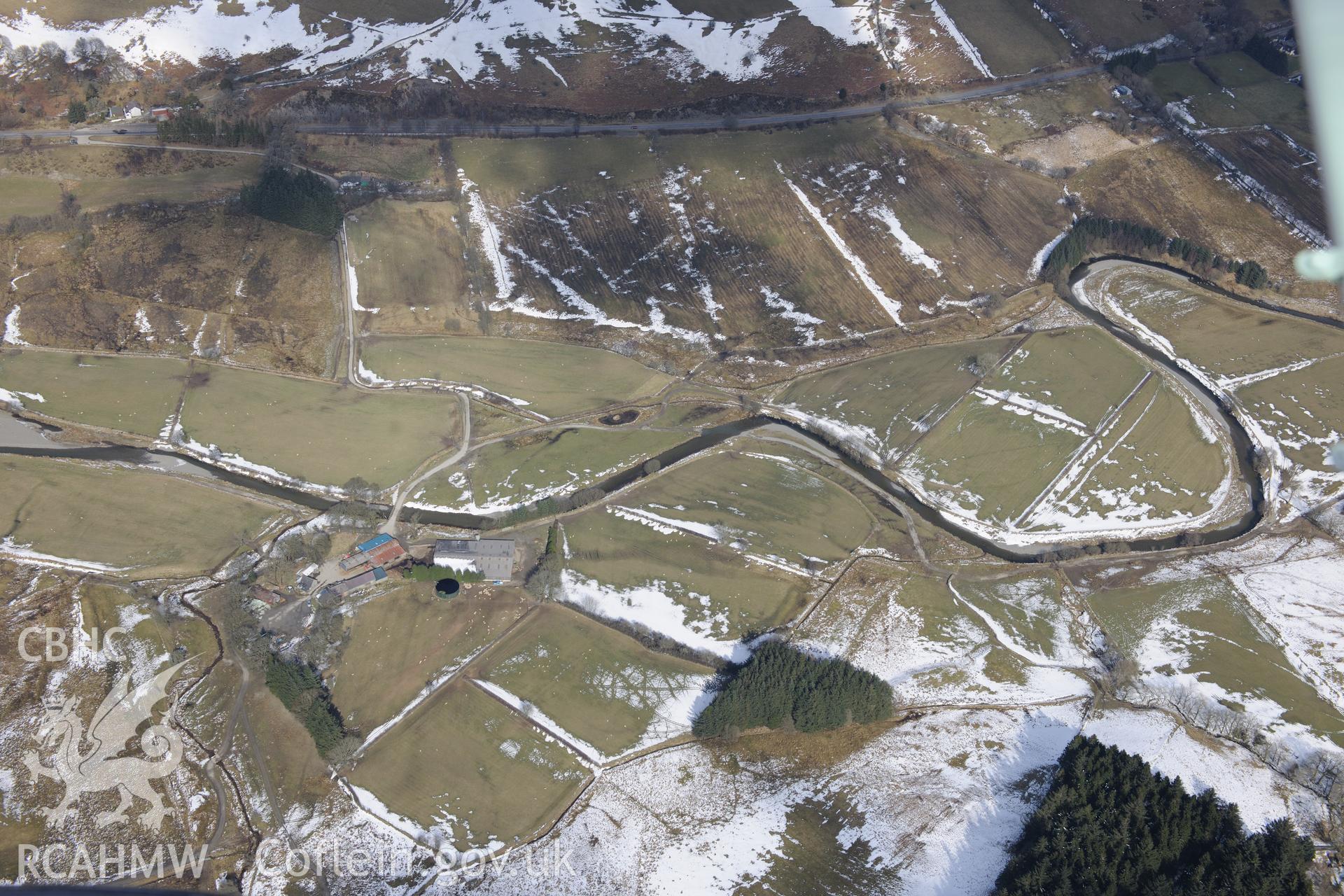 Ty-Mawr dwelling, Llangurig. Oblique aerial photograph taken during the Royal Commission's programme of archaeological aerial reconnaissance by Toby Driver on 2nd April 2013.