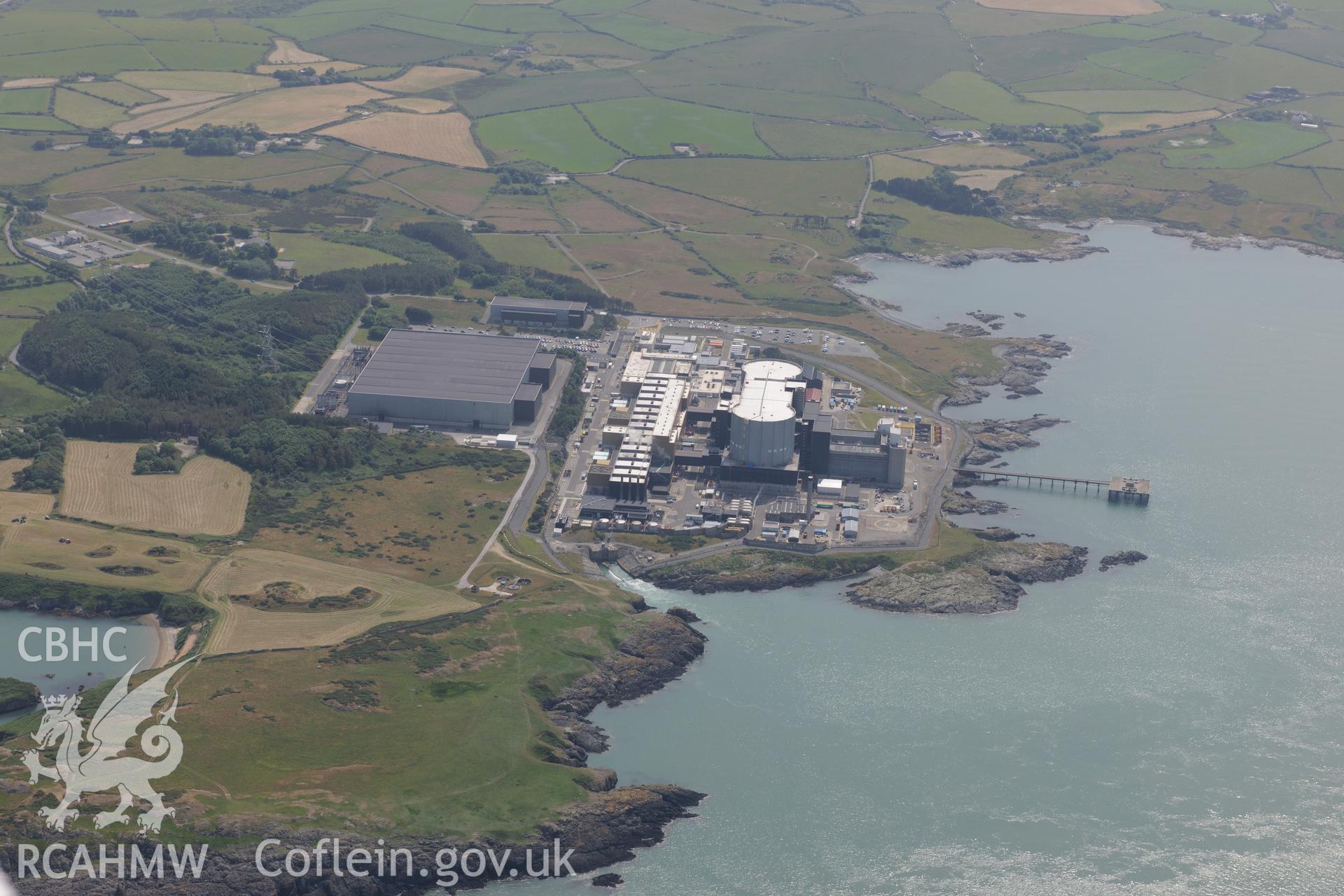 Wylfa Nuclear Power Station, near Cemmaes, on the north Anglesey coast. Oblique aerial photograph taken during the Royal Commission?s programme of archaeological aerial reconnaissance by Toby Driver on 12th July 2013.