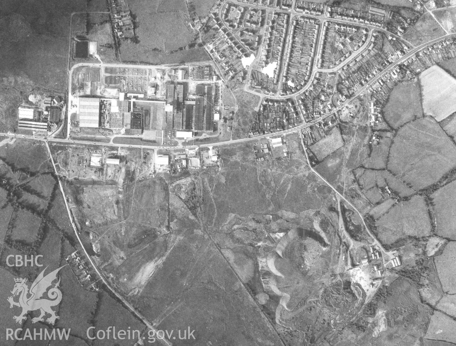 Black and white aerial photograph taken in 1970. Part of material used in a Setting Impact Assessment of Land off Phoenix Way, Garngoch Business Village, Swansea, carried out by Archaeology Wales, 2018. Project number P2631.