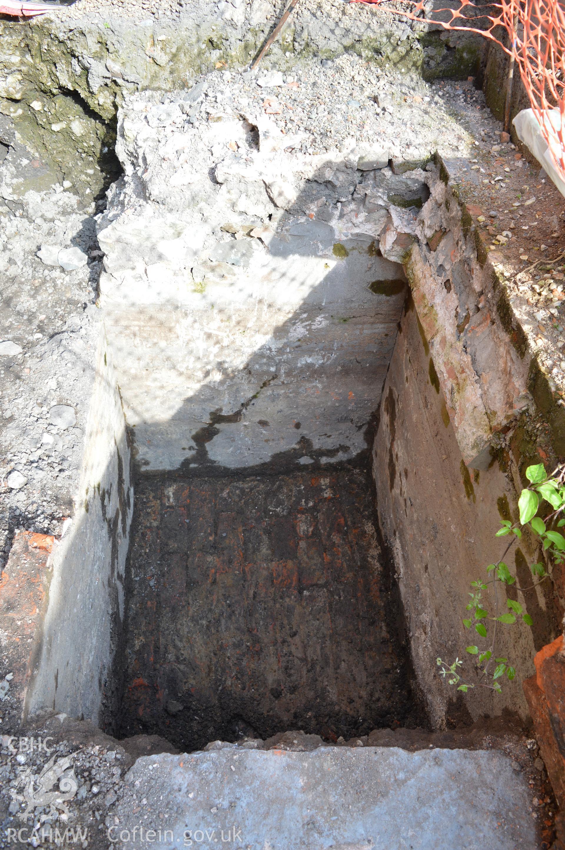 Digital colour photograph showing view from the east showing partially excavated cellar void. Photographed as part of CPAT Project 2351: 2 Severn Street, Welshpool, Powys - Archaeological Watching Brief, 2019. Report no. 1663.