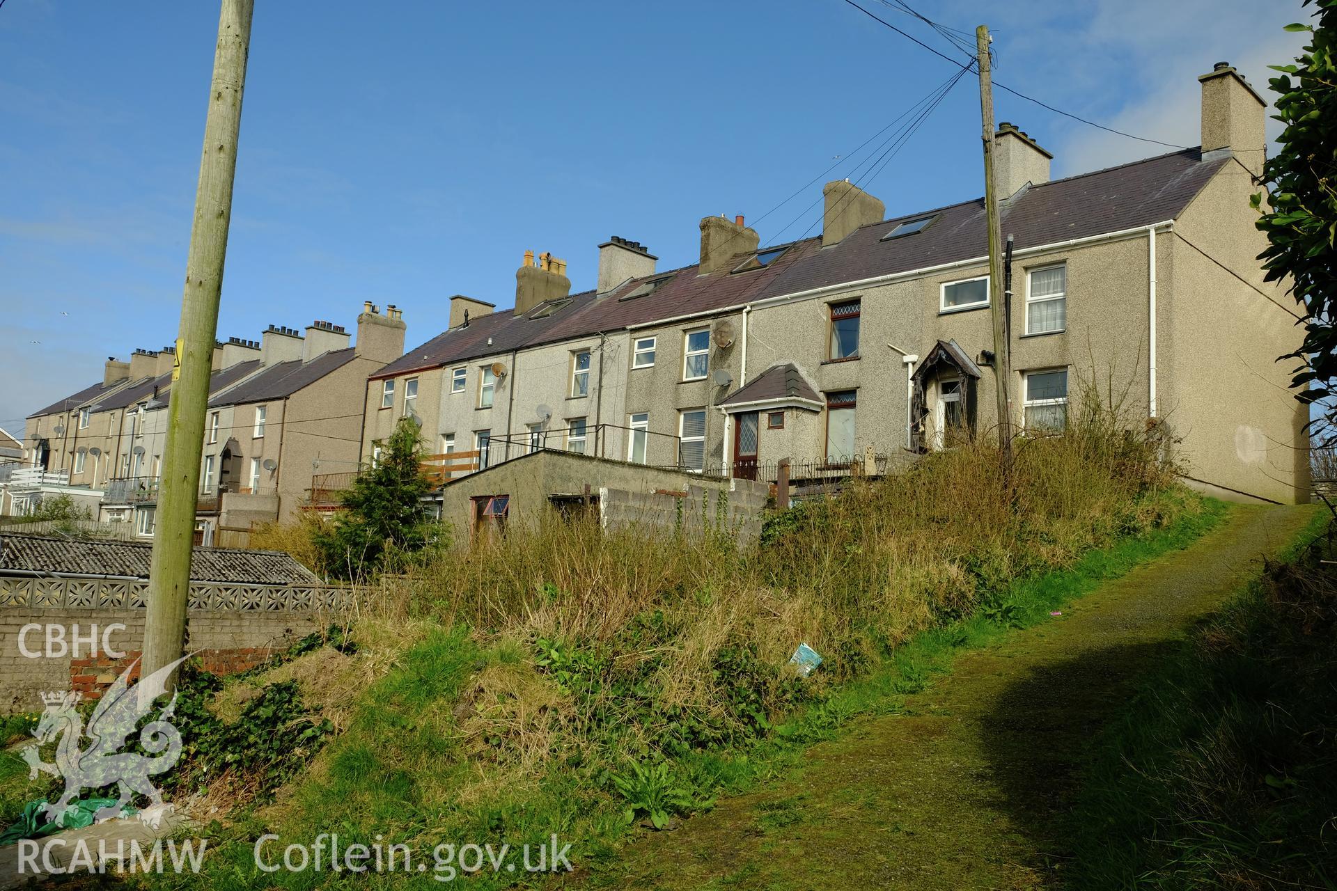 Colour photograph showing view looking north west of rear of houses on Coetmor Road, Bethesda, produced by Richard Hayman 16th March 2017